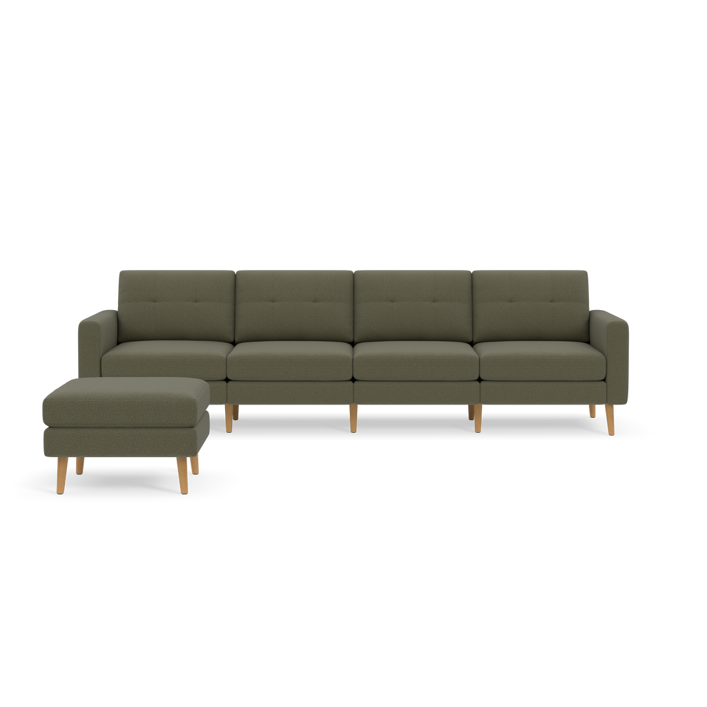 Modern Moss green fabric sectional sofa with wooden legs and matching ottoman on black background.