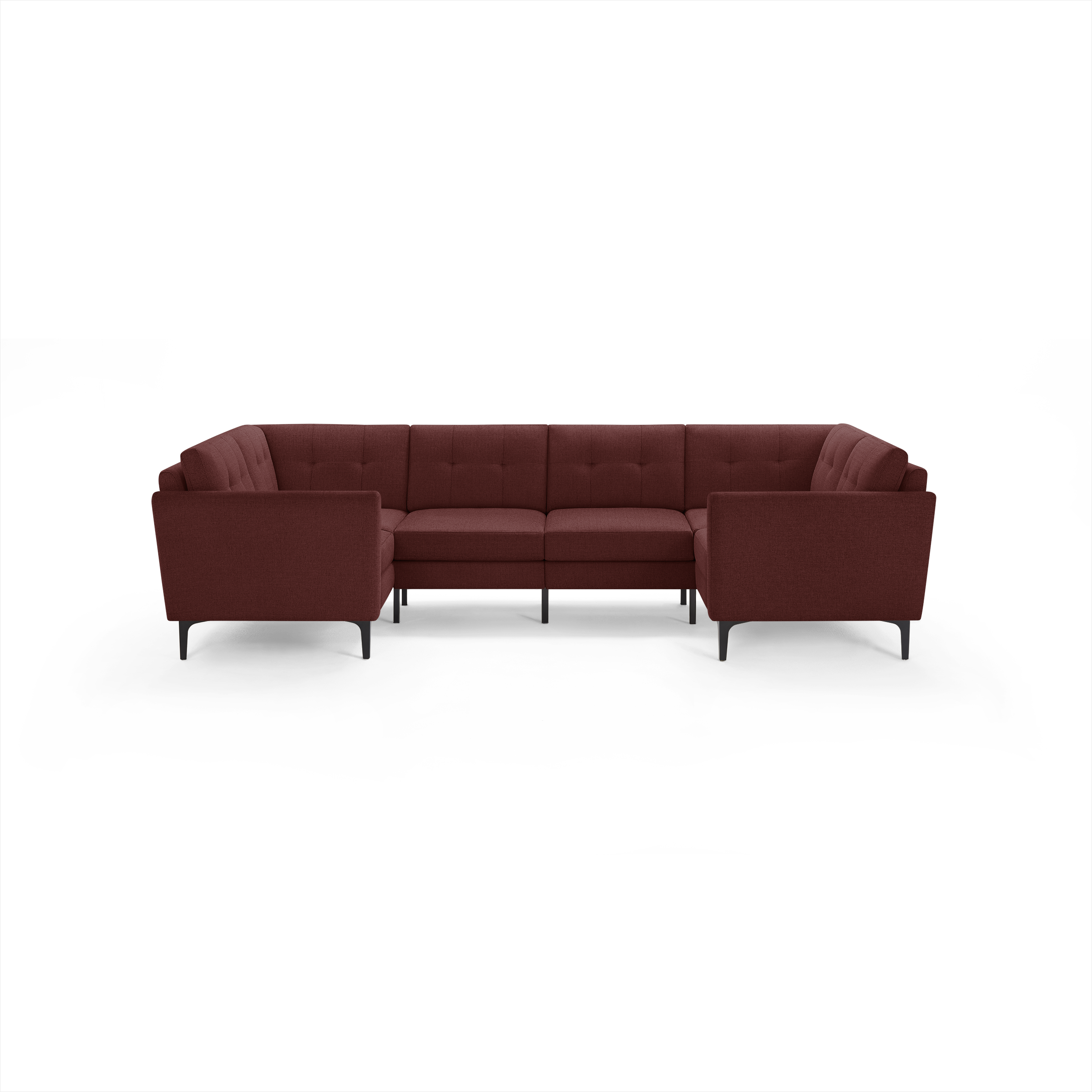 Large modern U-shaped sectional sofa upholstered in dark red fabric with tufted back cushions and black metal legs.