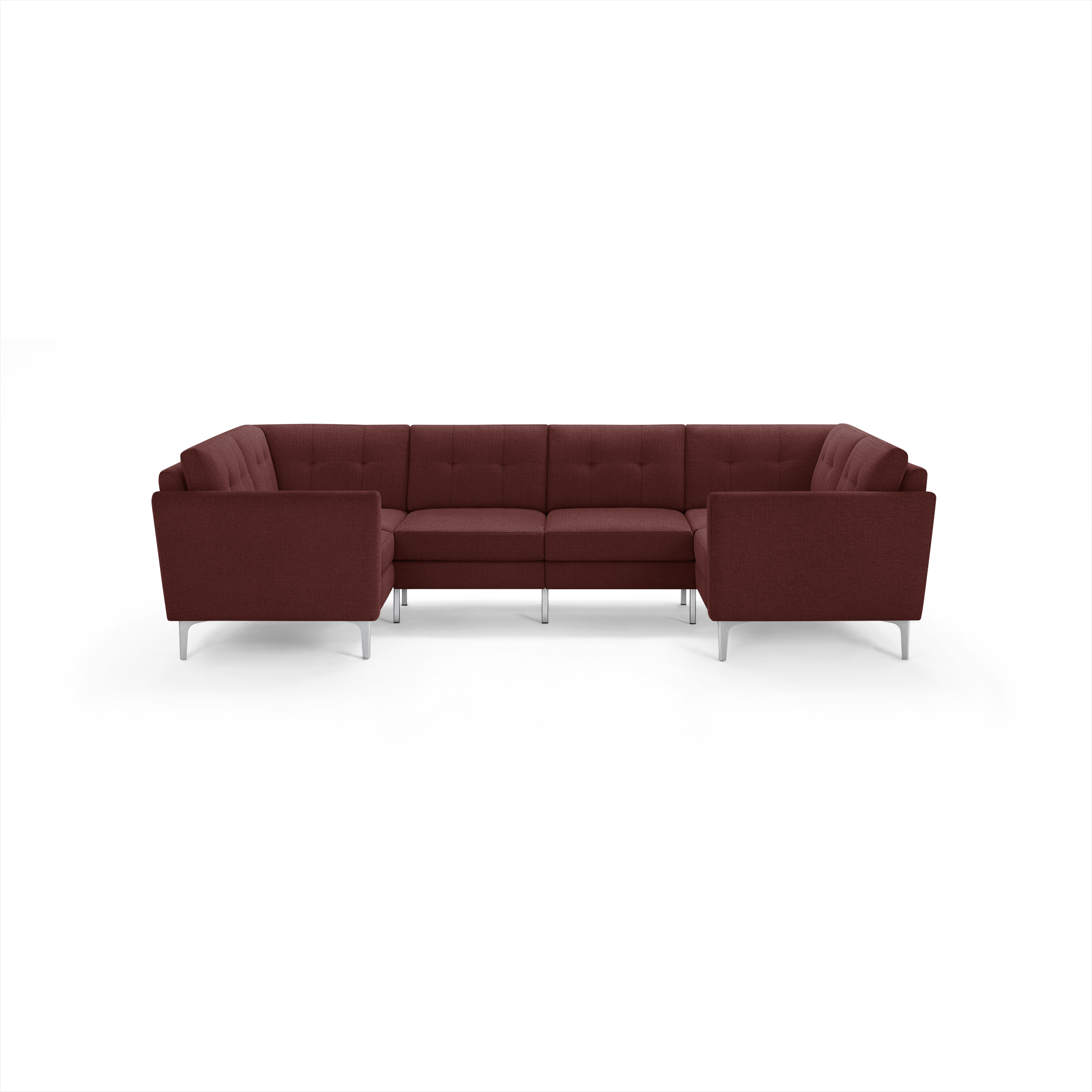 Modern U-shaped sectional sofa upholstered in deep red fabric with tufted back cushions and sleek silver metal legs.
