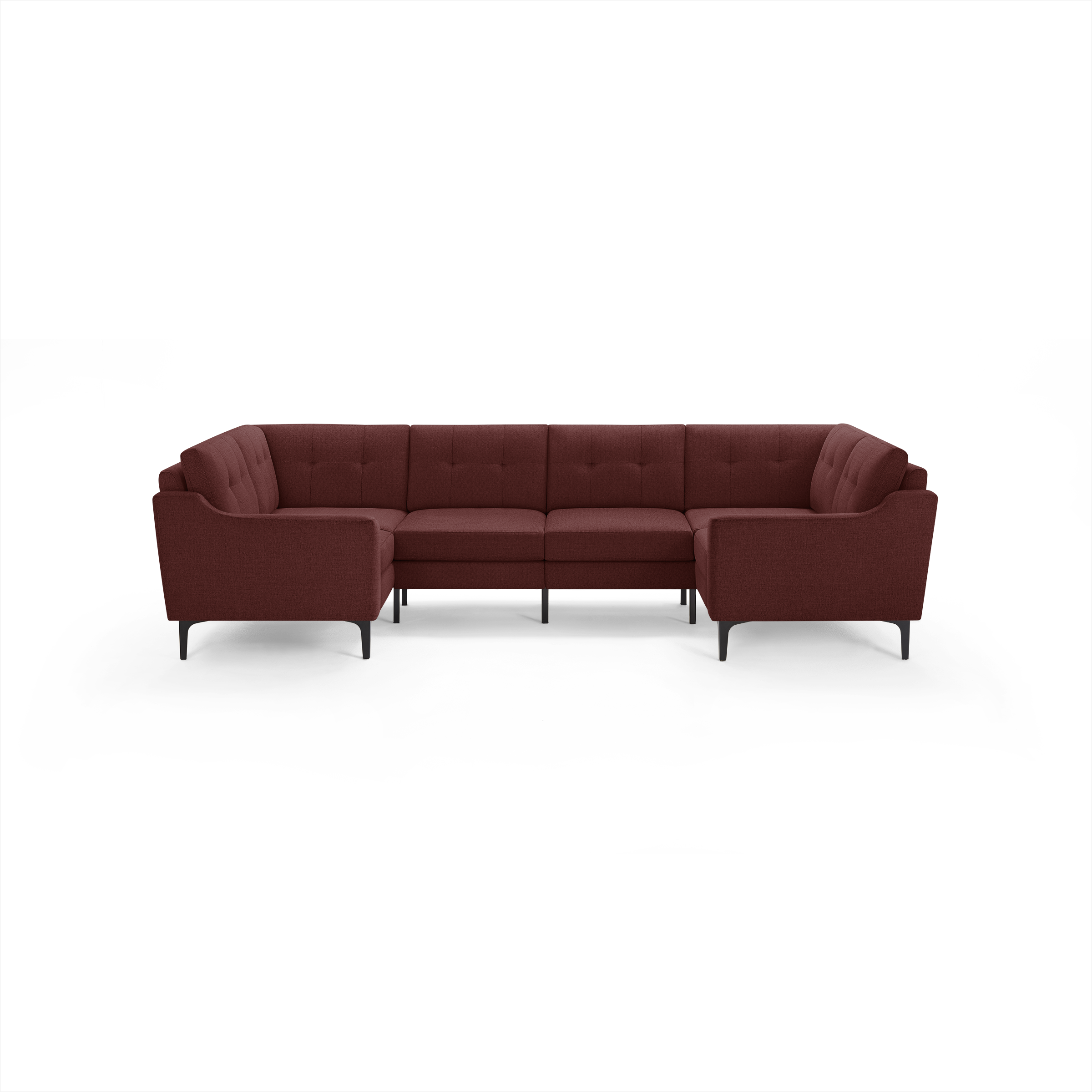 Modern U-shaped sectional sofa in deep burgundy fabric with tufted back cushions and black metal legs.