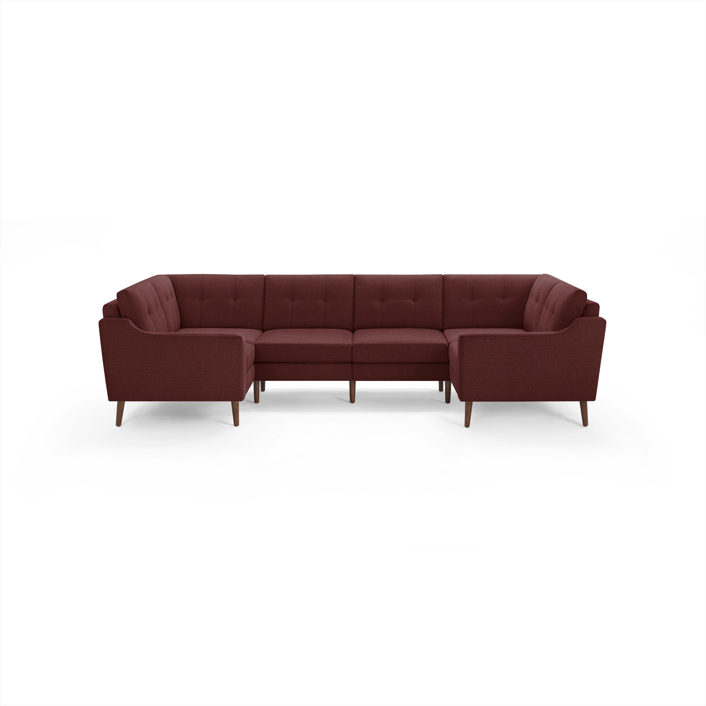 U-shaped sectional sofa upholstered in deep red fabric with tufted back cushions and wooden tapered legs.