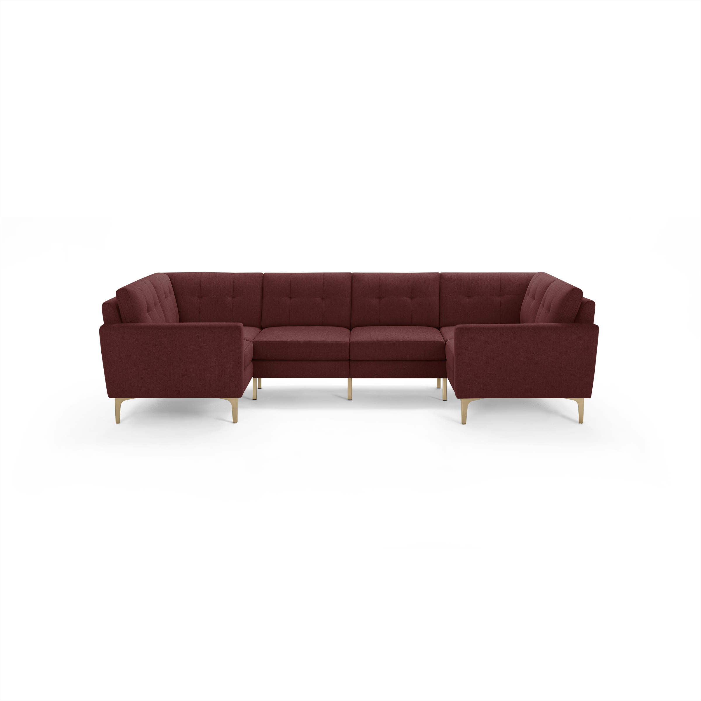 Modern U-shaped sectional sofa in deep red fabric with tufted cushions and light wooden legs, providing ample seating.