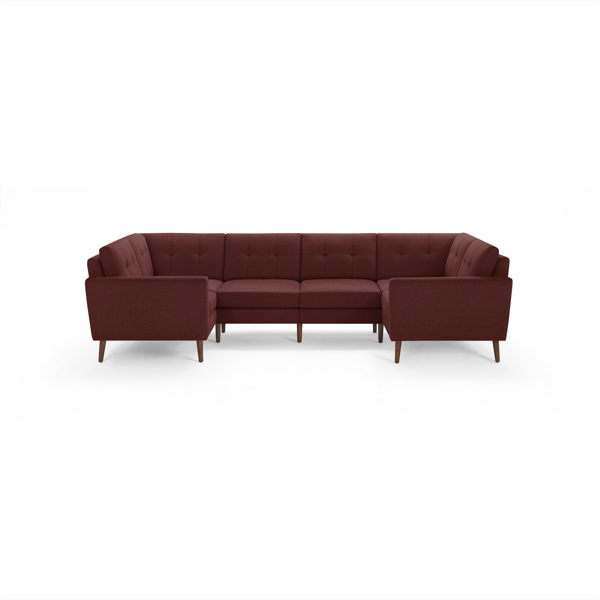 Modern U-shaped sectional sofa in deep red fabric with tufted back cushions and wooden tapered legs.