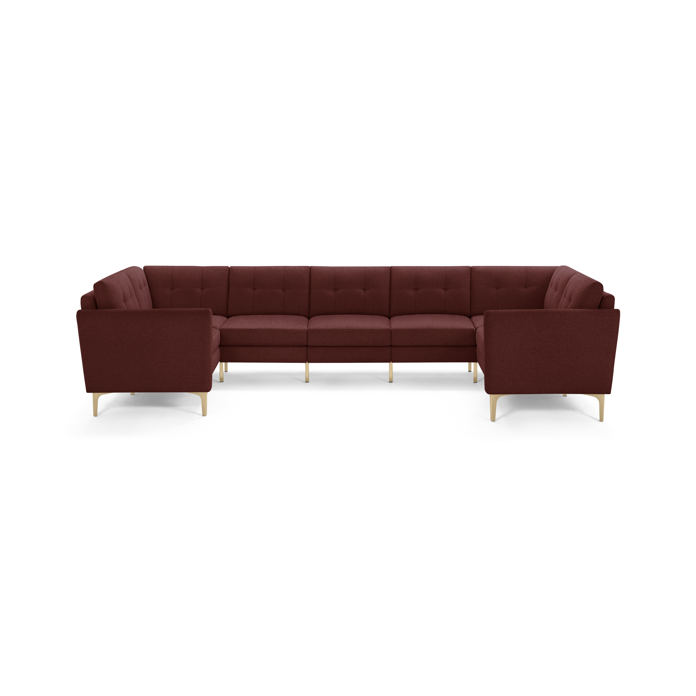 Large U-shaped sectional sofa in rich burgundy fabric with tufted cushions and light wooden legs, modern and spacious design.