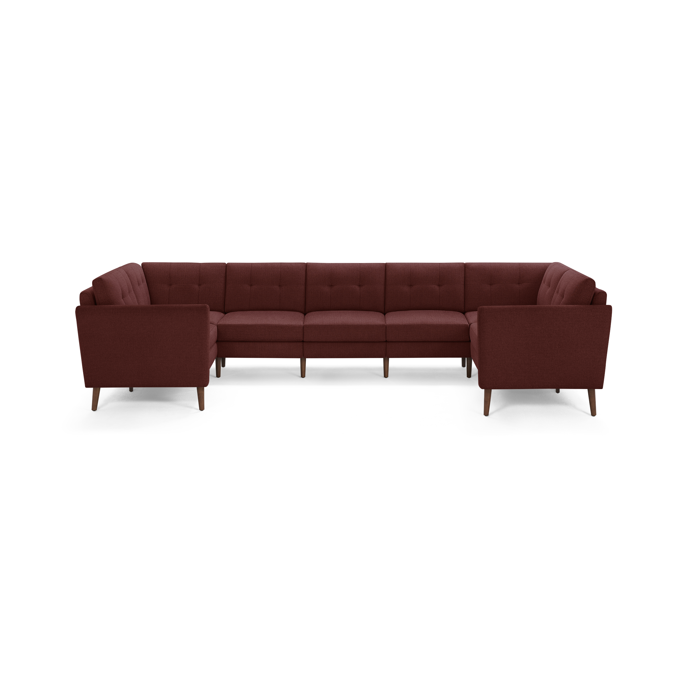 Large U-shaped sectional sofa with tufted backrest cushions, upholstered in dark red fabric and supported by wooden legs.