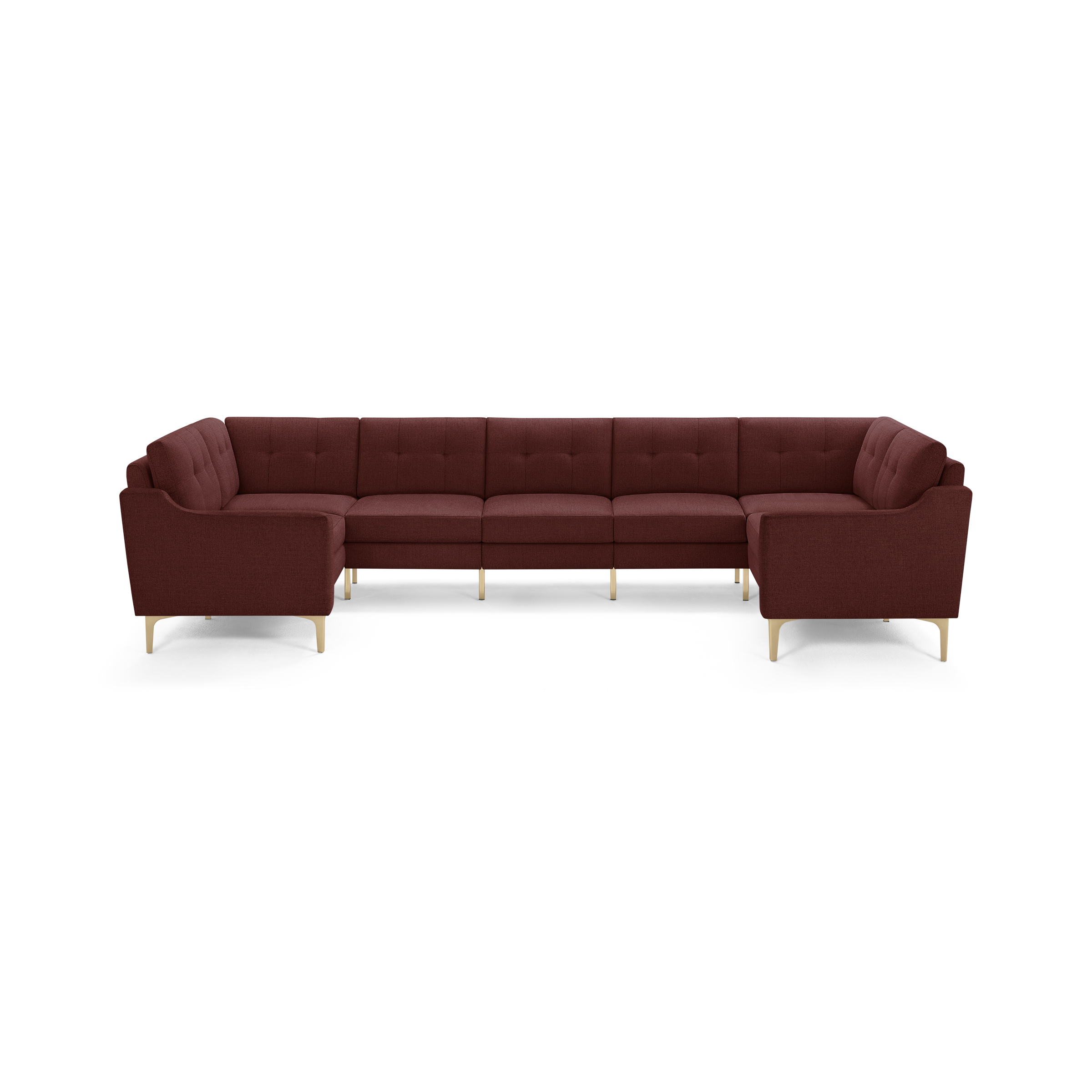 Spacious modern U-shaped sectional sofa in deep burgundy fabric with tufted back cushions and light wood legs.