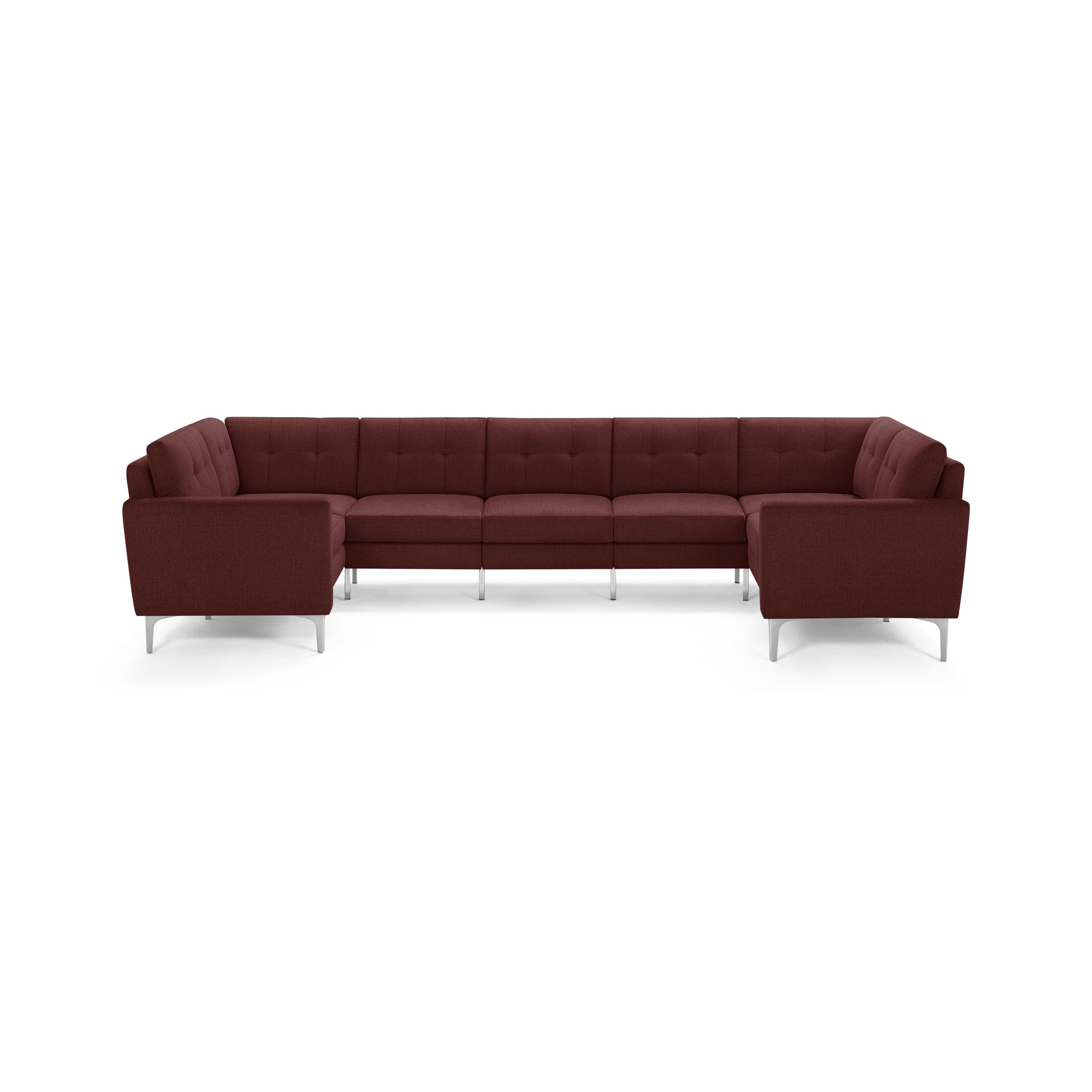 Large modern U-shaped sectional sofa in deep burgundy fabric with tufted cushions and sleek silver legs.
