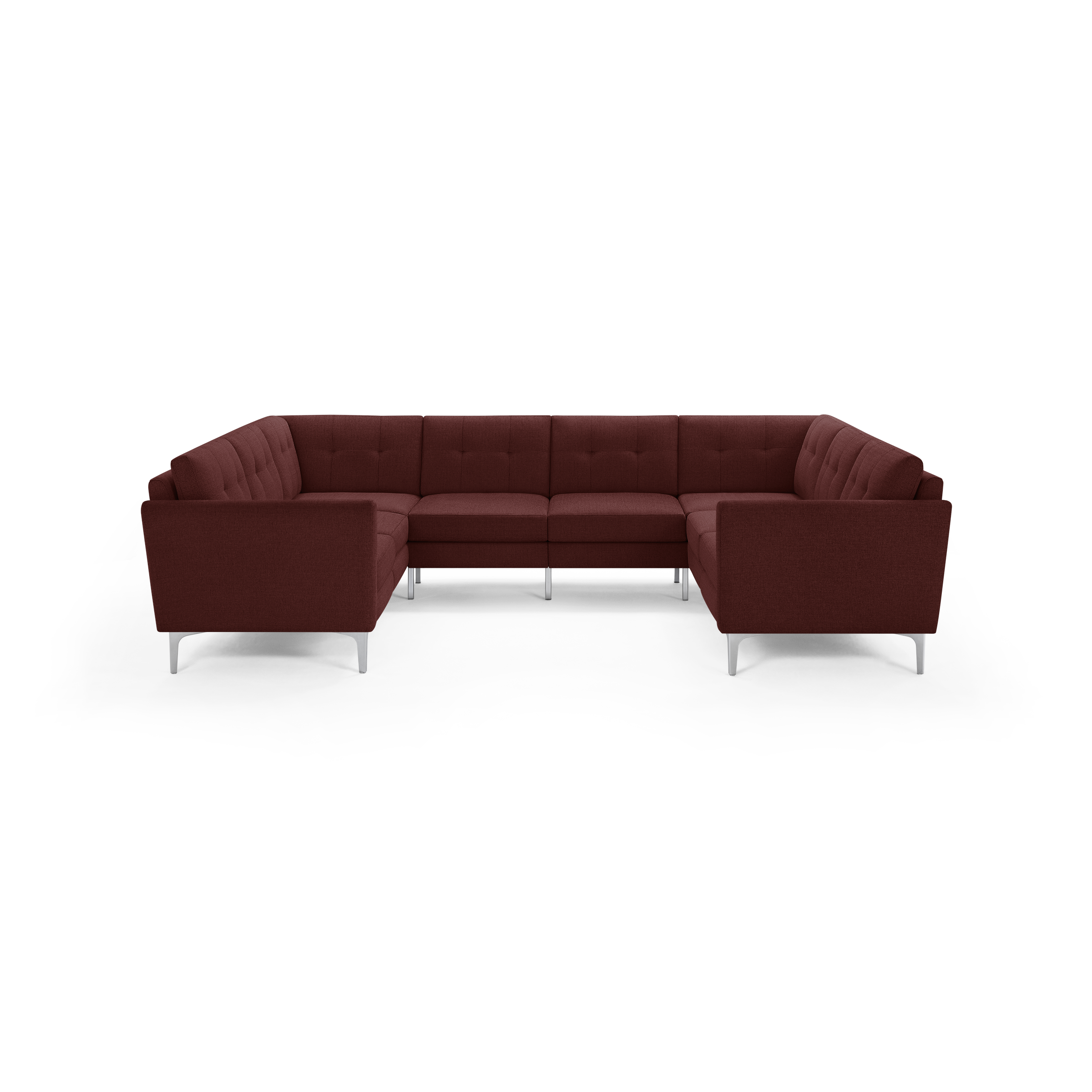 Large modern U-shaped sectional sofa in deep red fabric with tufted cushions and slim silver legs, designed for spacious living rooms.