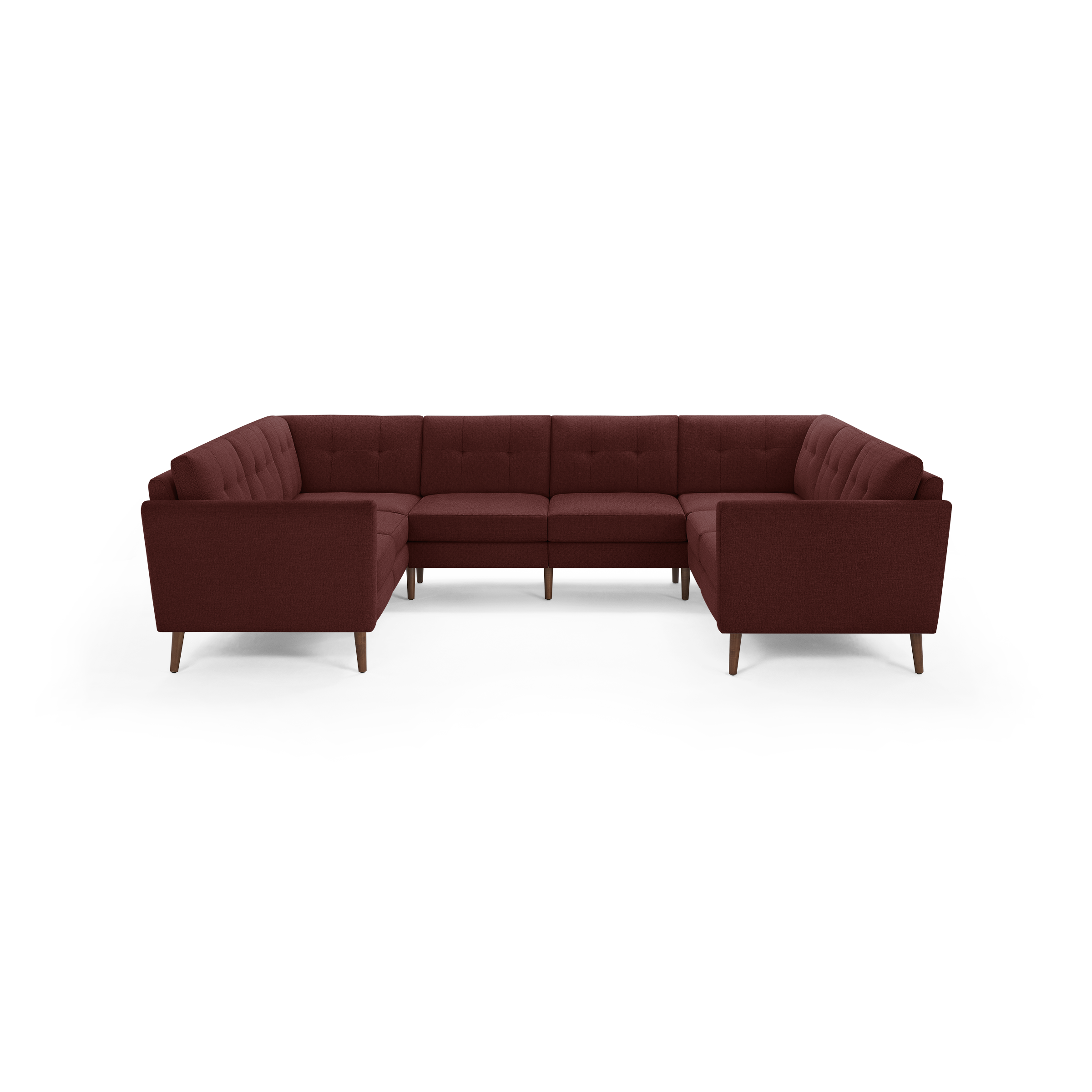 Large U-shaped sectional sofa with tufted back cushions and wooden legs, upholstered in rich burgundy fabric.