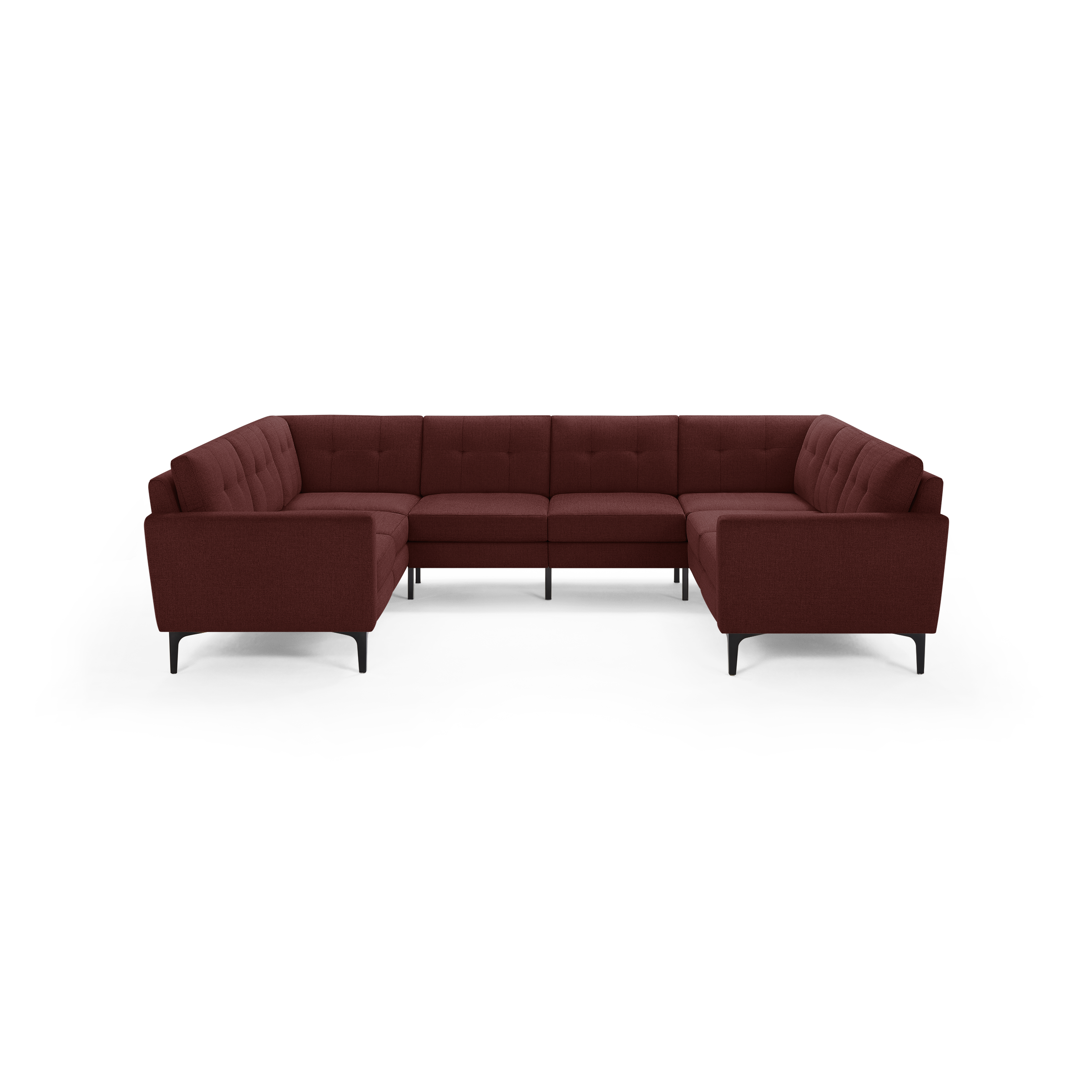 U-shaped sectional sofa in dark red fabric with tufted cushions and slim black metal legs, modern design.