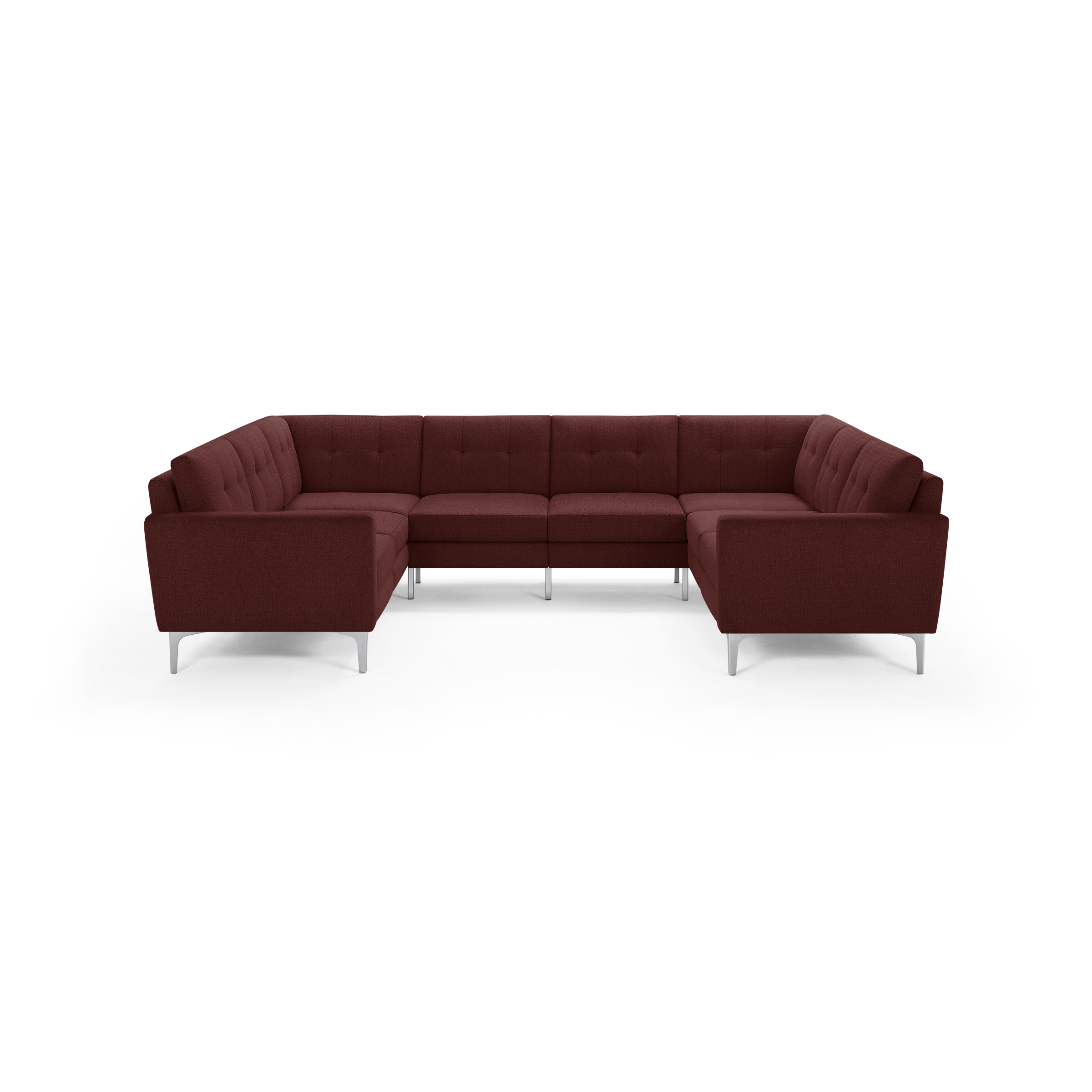 Large modern U-shaped sectional sofa in deep red fabric with tufted cushions and slim silver metal legs.