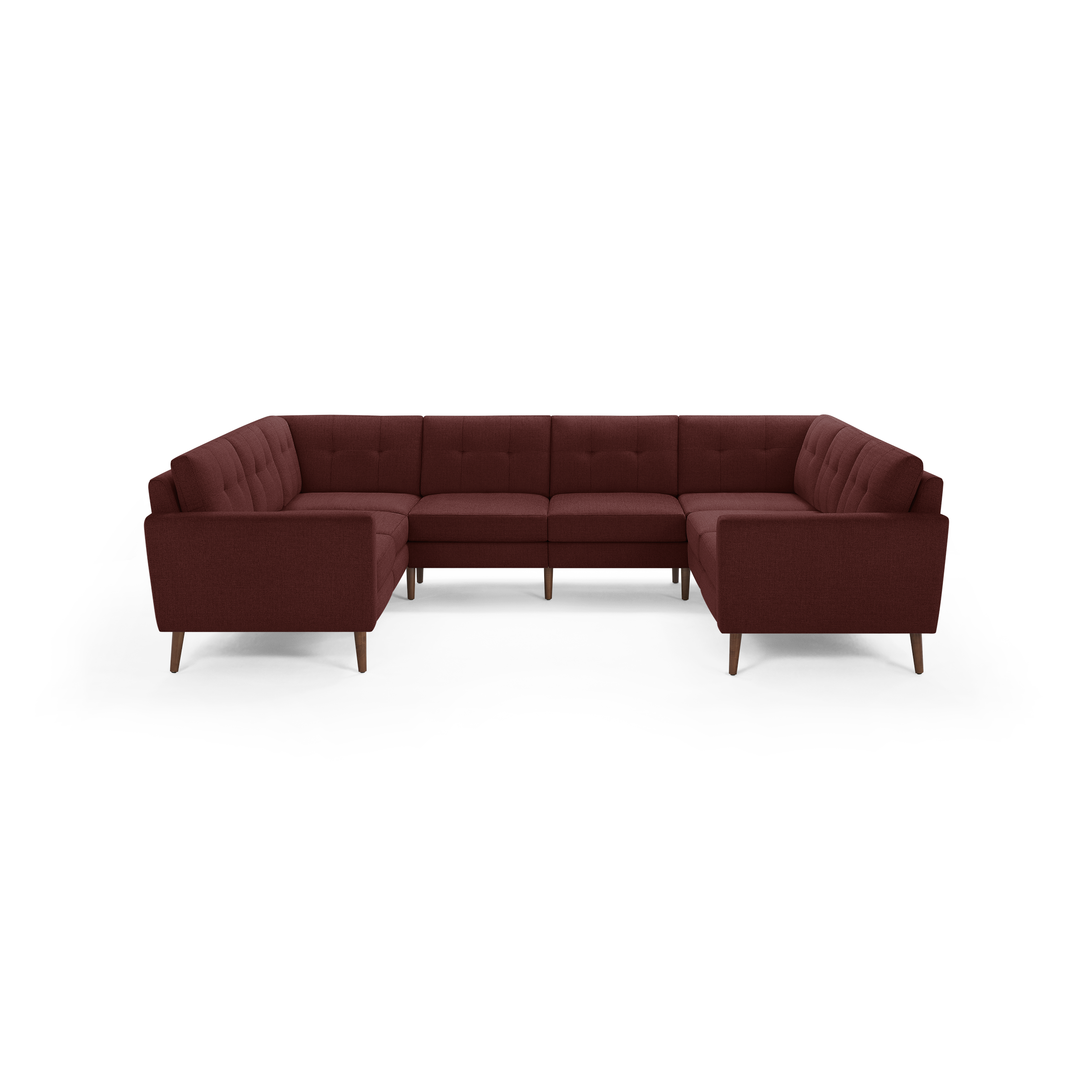 Modern U-shaped sectional sofa with deep red fabric upholstery, tufted back cushions, and wooden tapered legs.