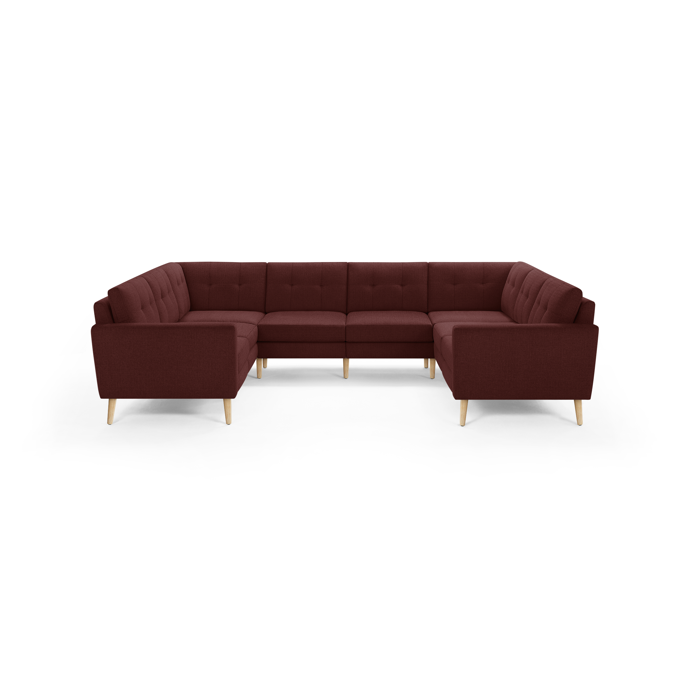 U-shaped sectional sofa in deep burgundy fabric with tufted back cushions and light wooden tapered legs, modern and spacious design.