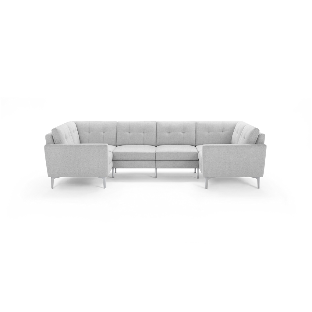 Light gray modern sectional sofa with tufted backrest, clean lines, and slim metal legs, designed for spacious seating.