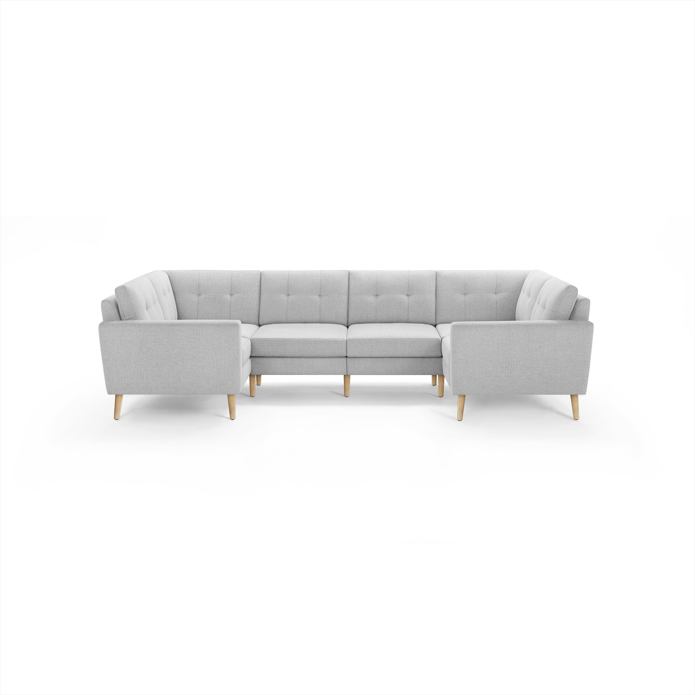 Light gray L-shaped sectional sofa with tufted back cushions and wooden legs, designed for spacious seating and modern decor.
