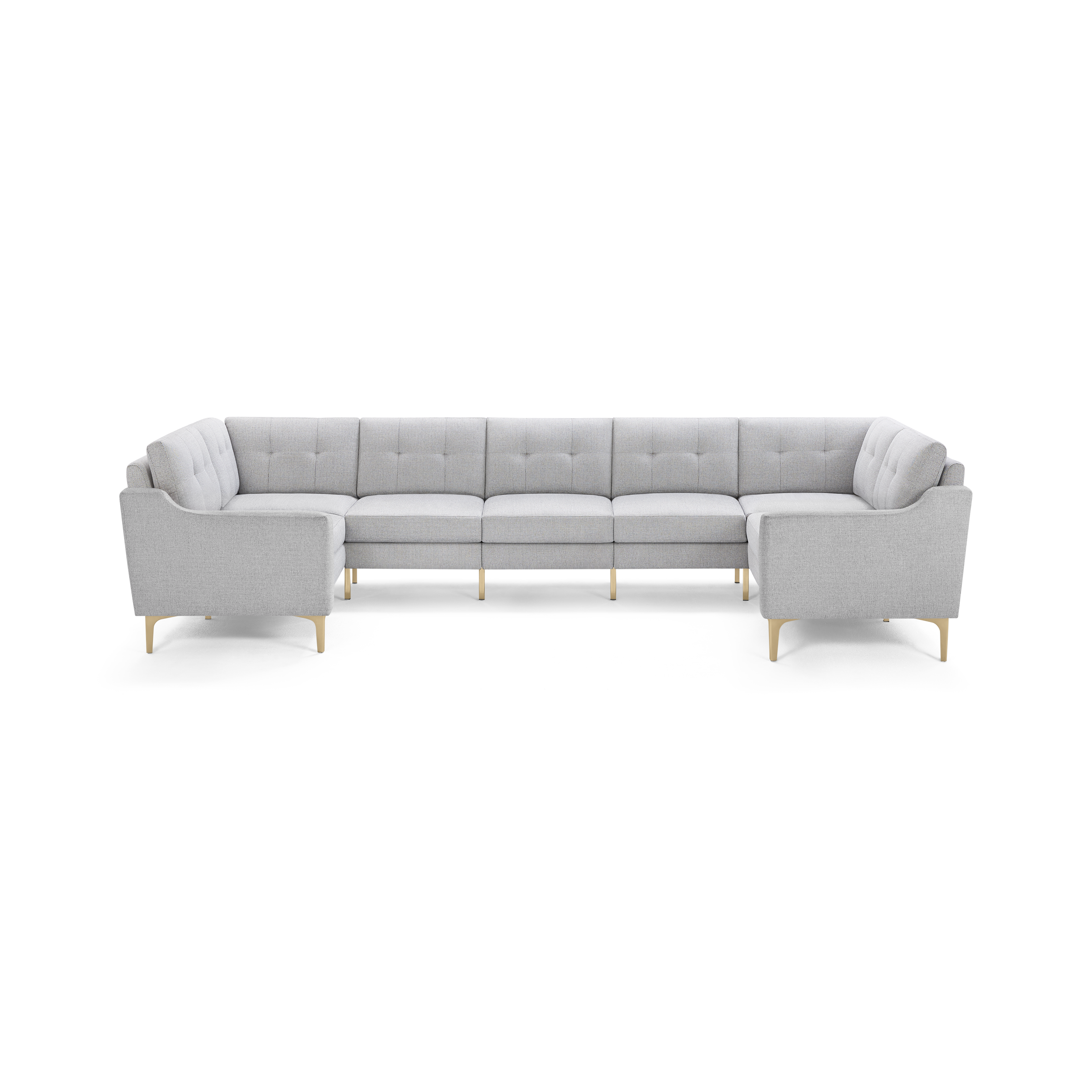 Light gray modern sectional sofa with tufted back cushions and wooden legs, designed in a U-shape for ample seating.