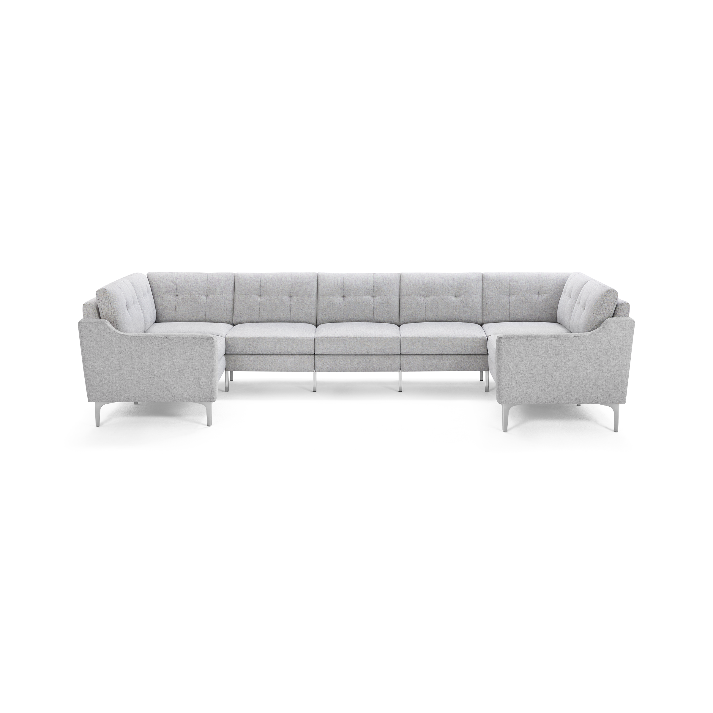Light grey, modern U-shaped sectional sofa with tufted back cushions and slim metal legs, designed for spacious seating.