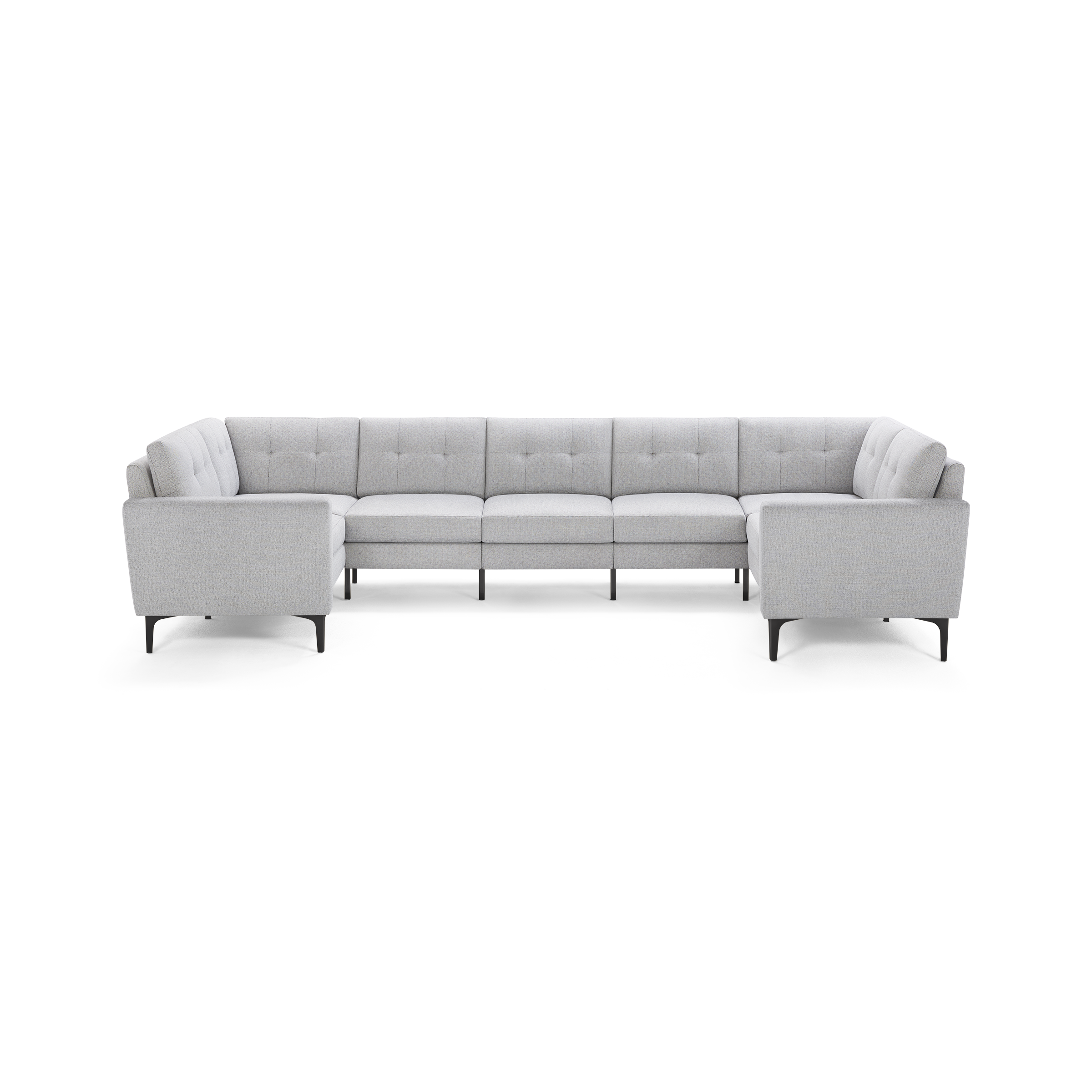 Light gray modern sectional sofa with tufted back cushions, straight arms, and black angled legs, designed for spacious seating.