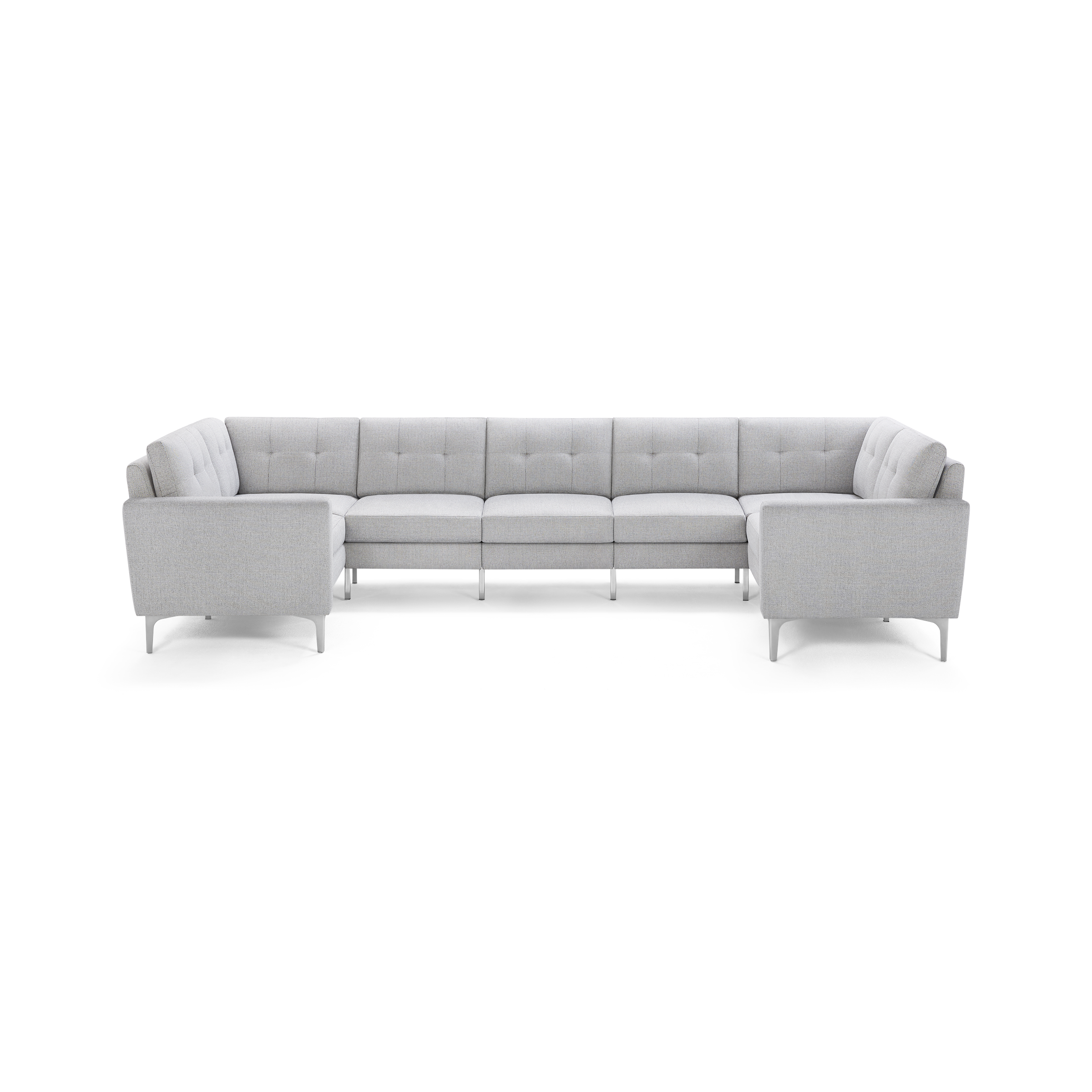 Light gray upholstered sectional sofa with tufted back cushions and metal legs, arranged in a U-shape.