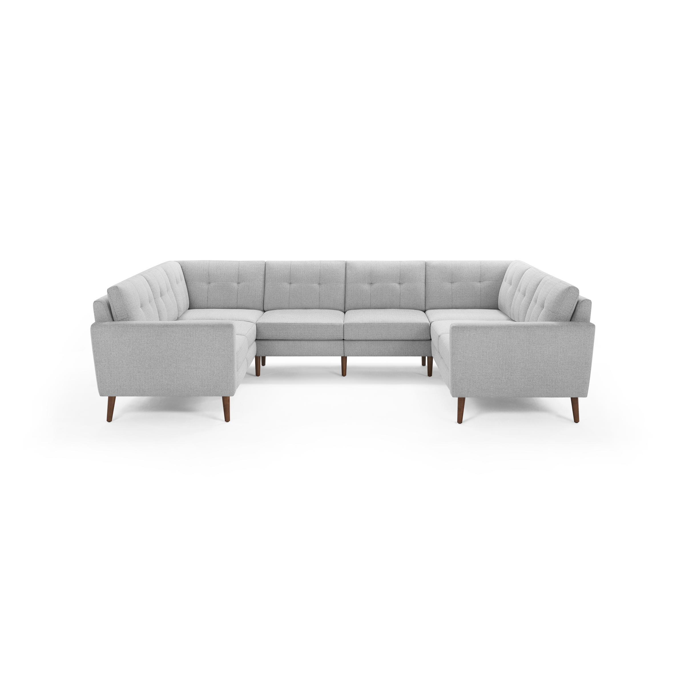 Light gray fabric U-shaped sectional sofa with tufted back cushions and wooden tapered legs, designed for modern living rooms.