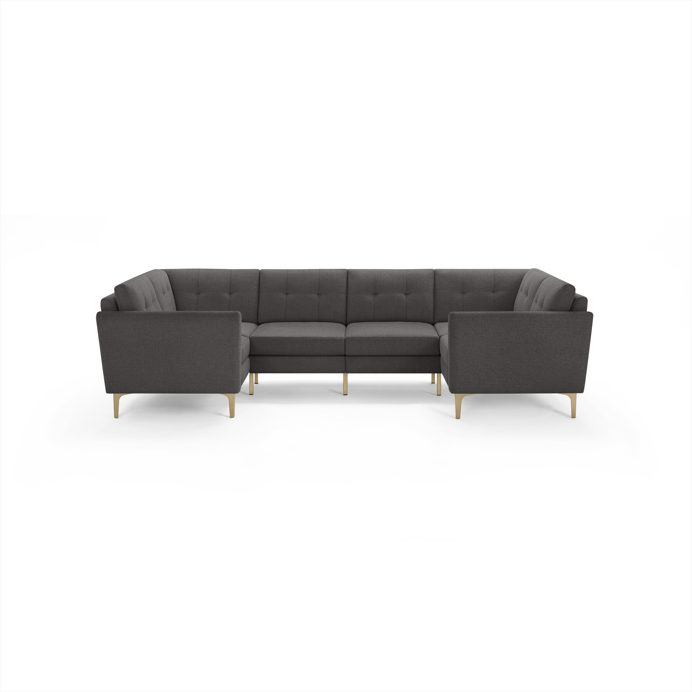 Dark gray fabric U-shaped sectional sofa with tufted cushions and light wooden legs on a black background.