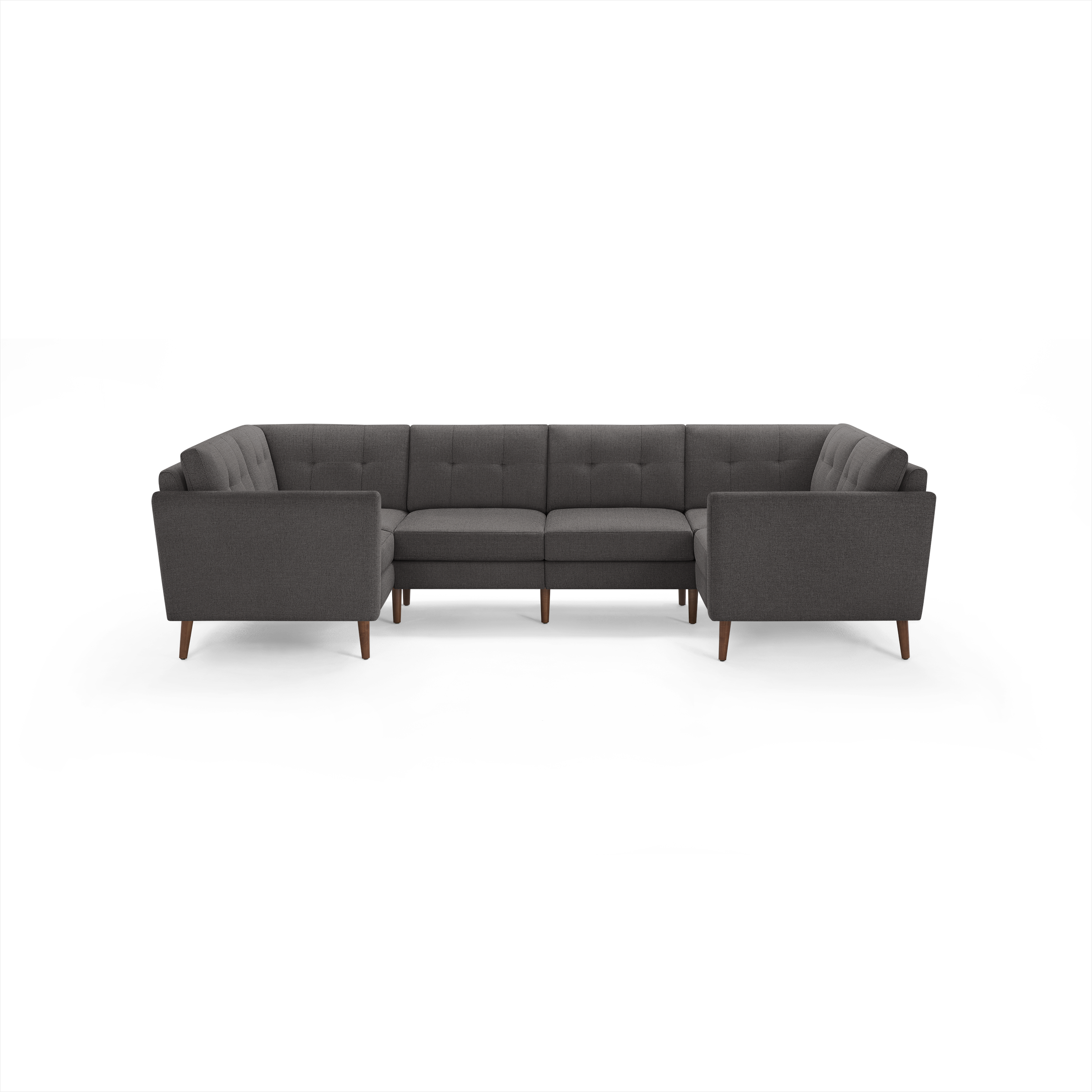 Dark gray upholstered sectional sofa with tufted back cushions, straight arms, and wooden legs, arranged in a U-shape.