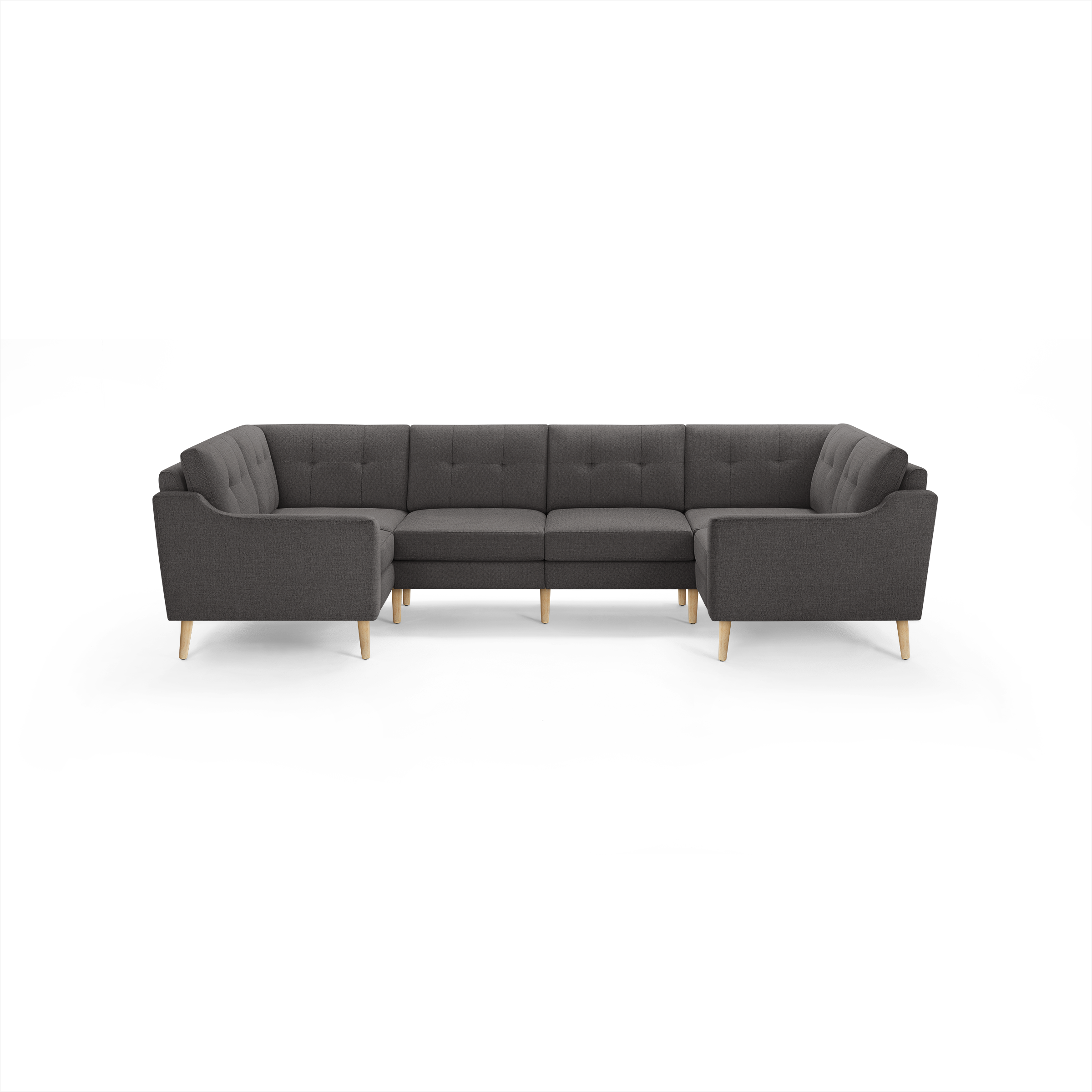 Dark gray L-shaped sectional sofa with tufted cushions and light wooden legs, designed for spacious seating.