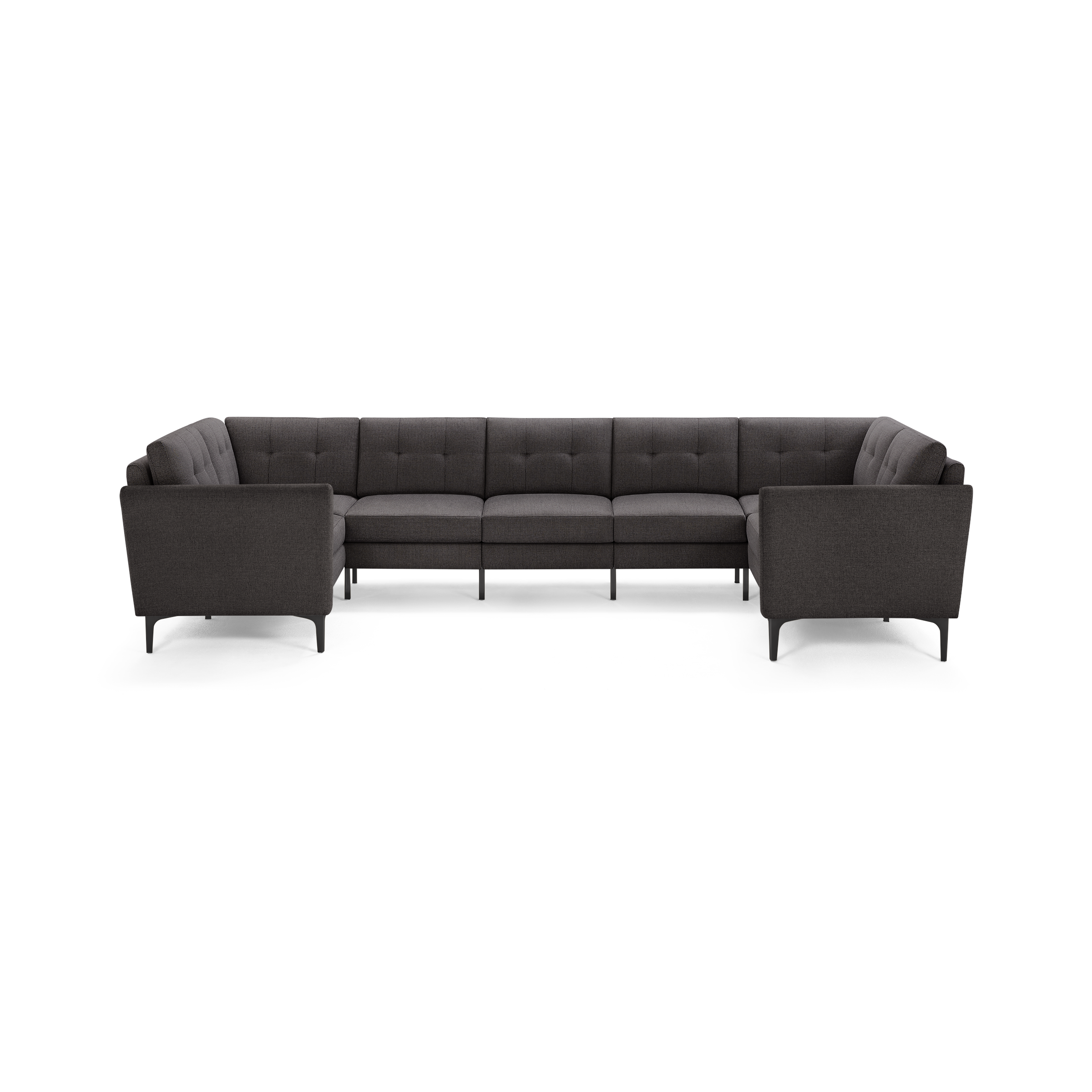 Dark gray, modern U-shaped sectional sofa with tufted cushions, slim arms, and black tapered legs.