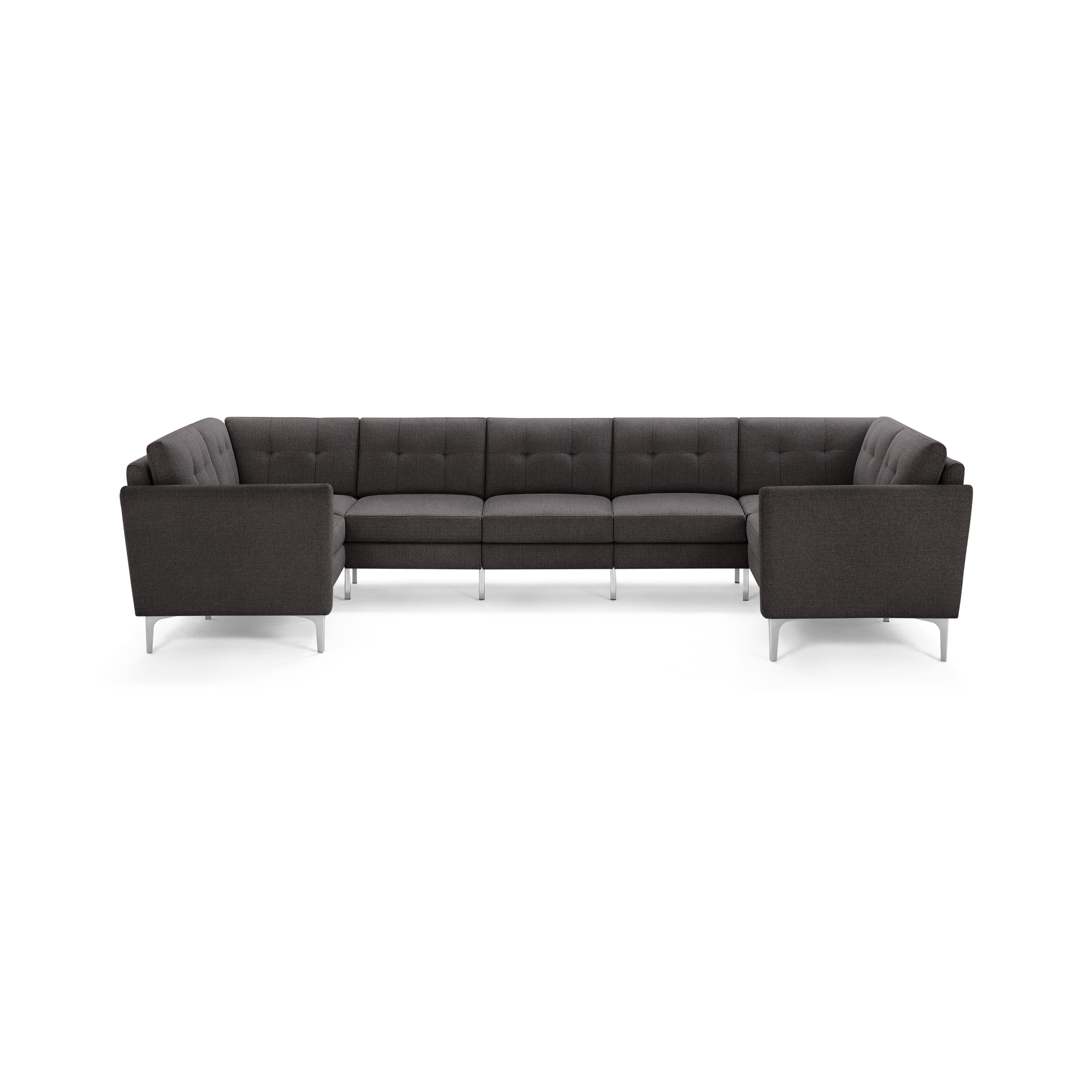 Dark gray fabric sectional sofa with tufted cushions, angular armrests, and sleek metal legs, arranged in a U-shape.