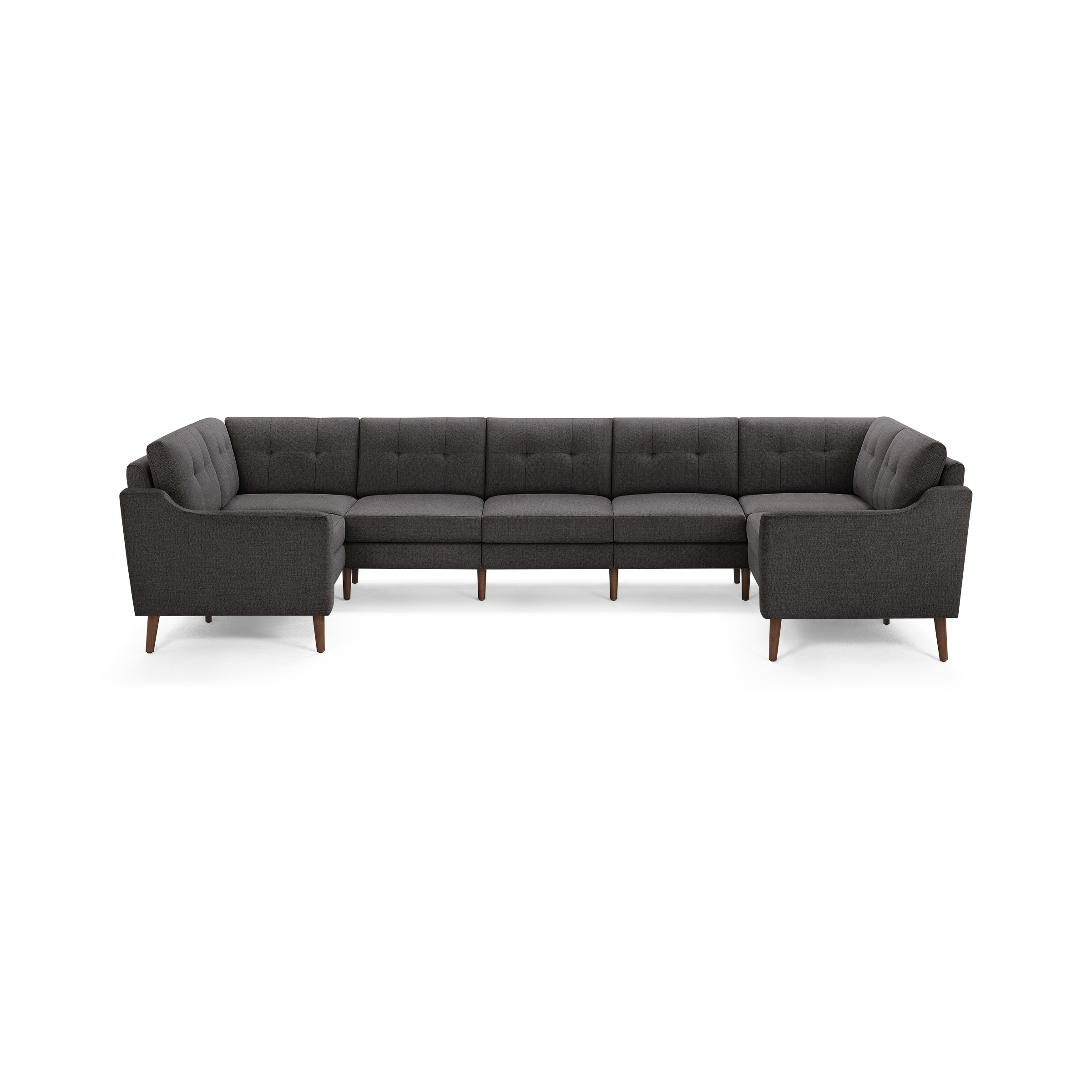 Dark gray fabric U-shaped sectional sofa with tufted back cushions and tapered wooden legs.