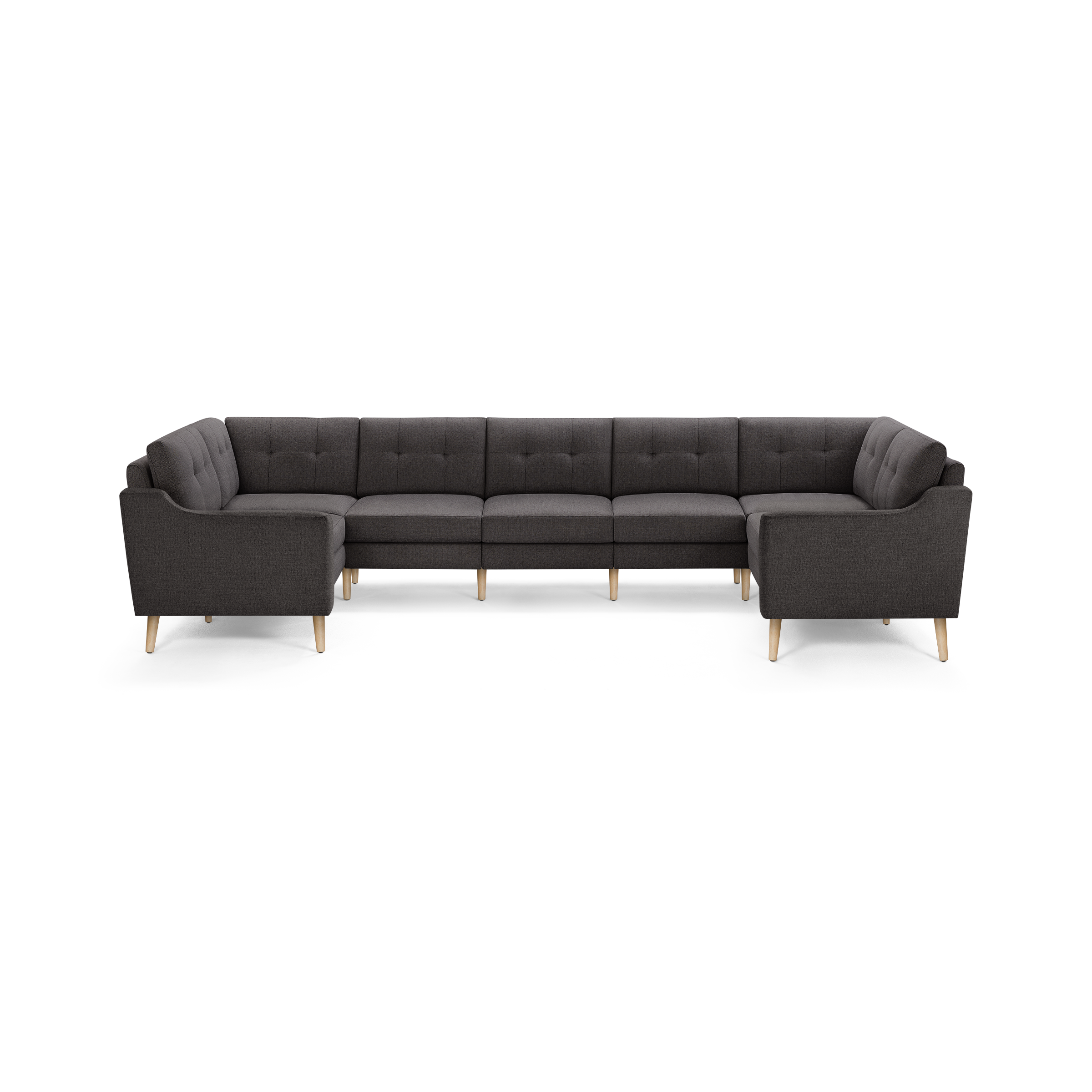Dark gray fabric upholstered U-shaped sectional sofa with tufted back cushions and light wooden tapered legs.