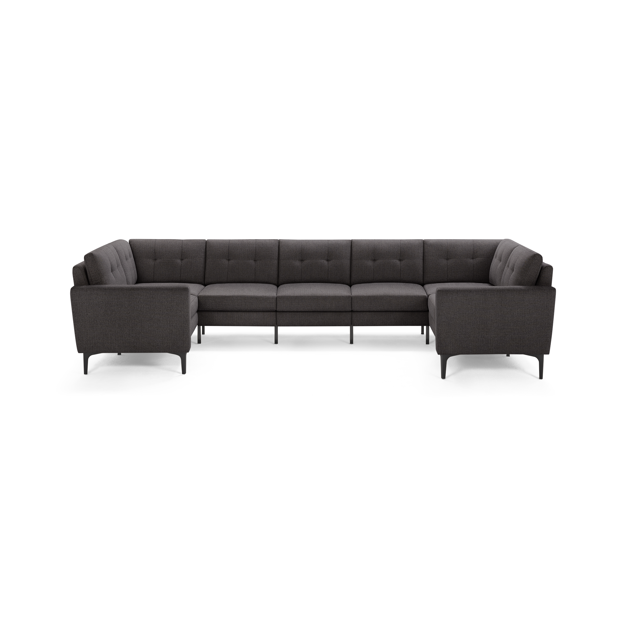 Dark gray fabric U-shaped sectional sofa with tufted cushions, slim armrests, and modern angled black legs.