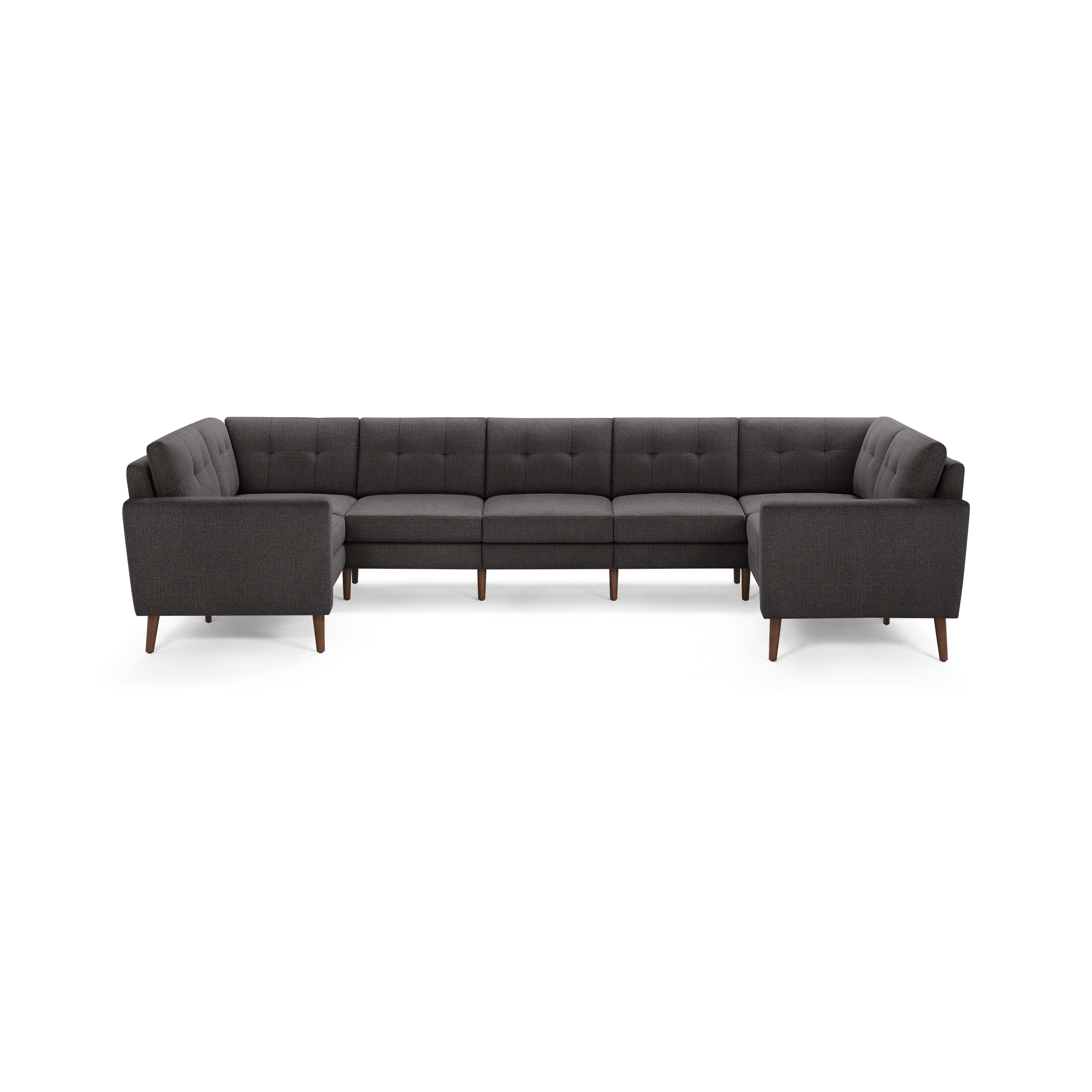 Dark gray upholstered sectional sofa with tufted back cushions and wooden legs, arranged in a U-shaped configuration.