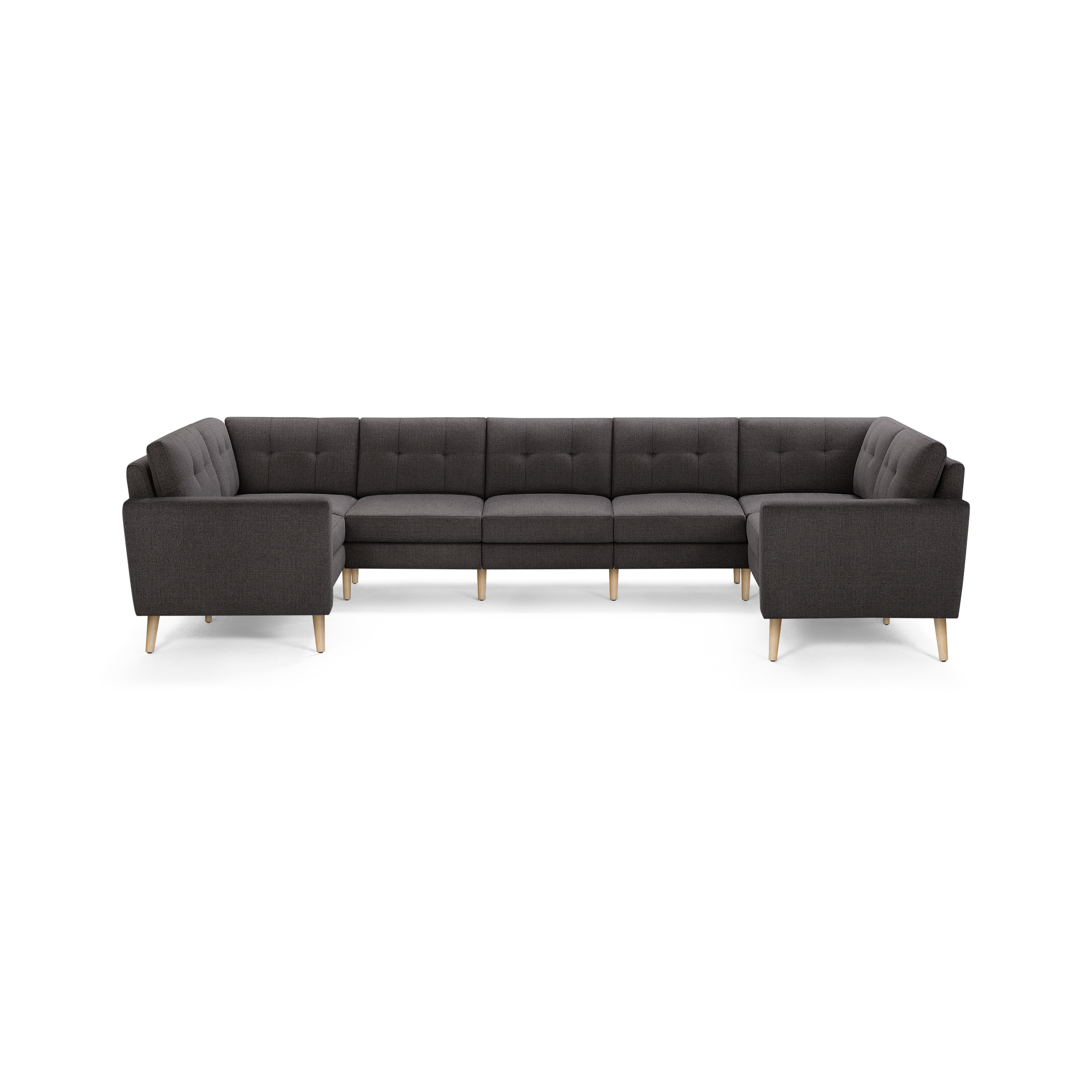 Dark gray L-shaped sectional sofa with tufted back cushions and light wooden legs, modern and spacious.