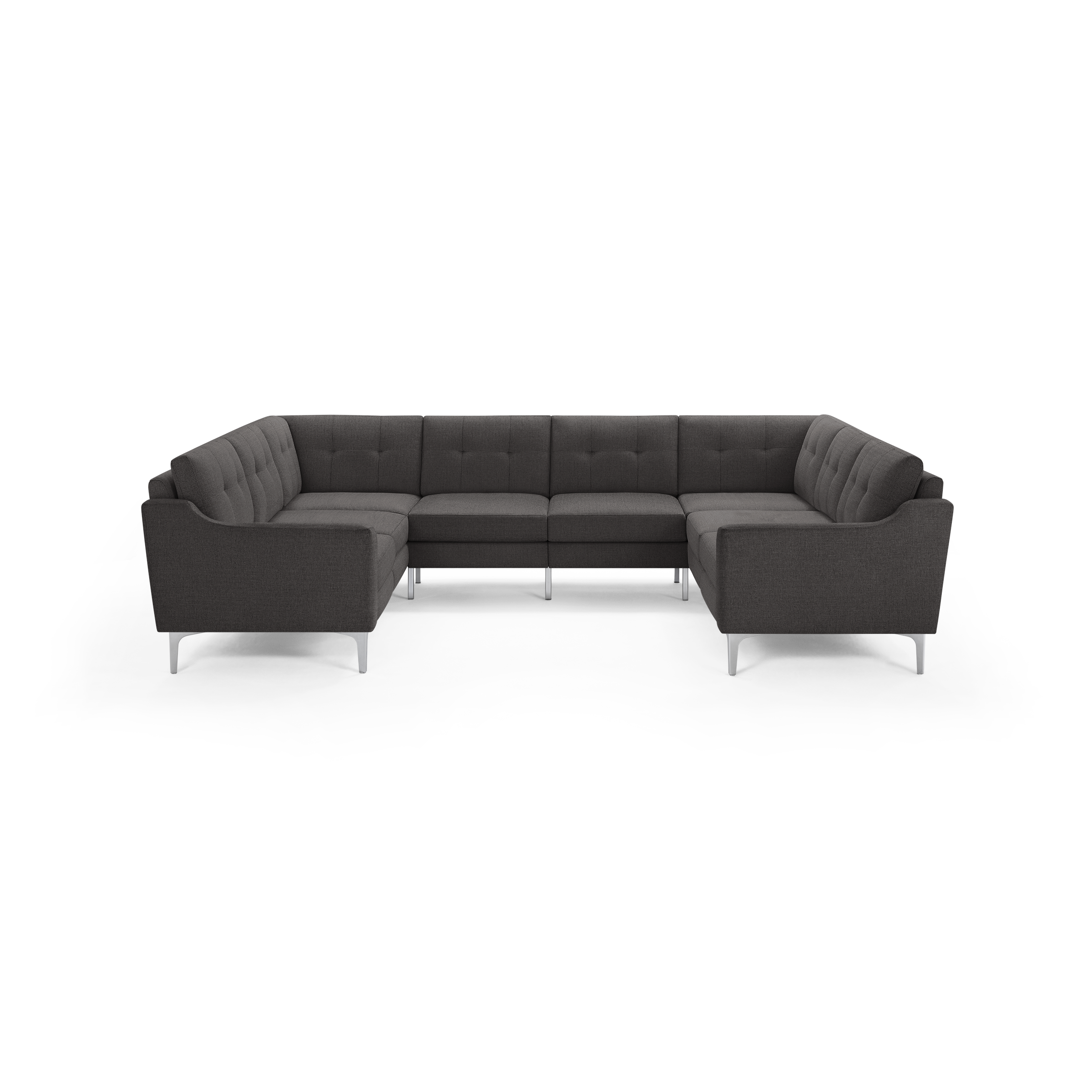Dark gray fabric U-shaped sectional sofa with tufted back cushions and slim angled metal legs.