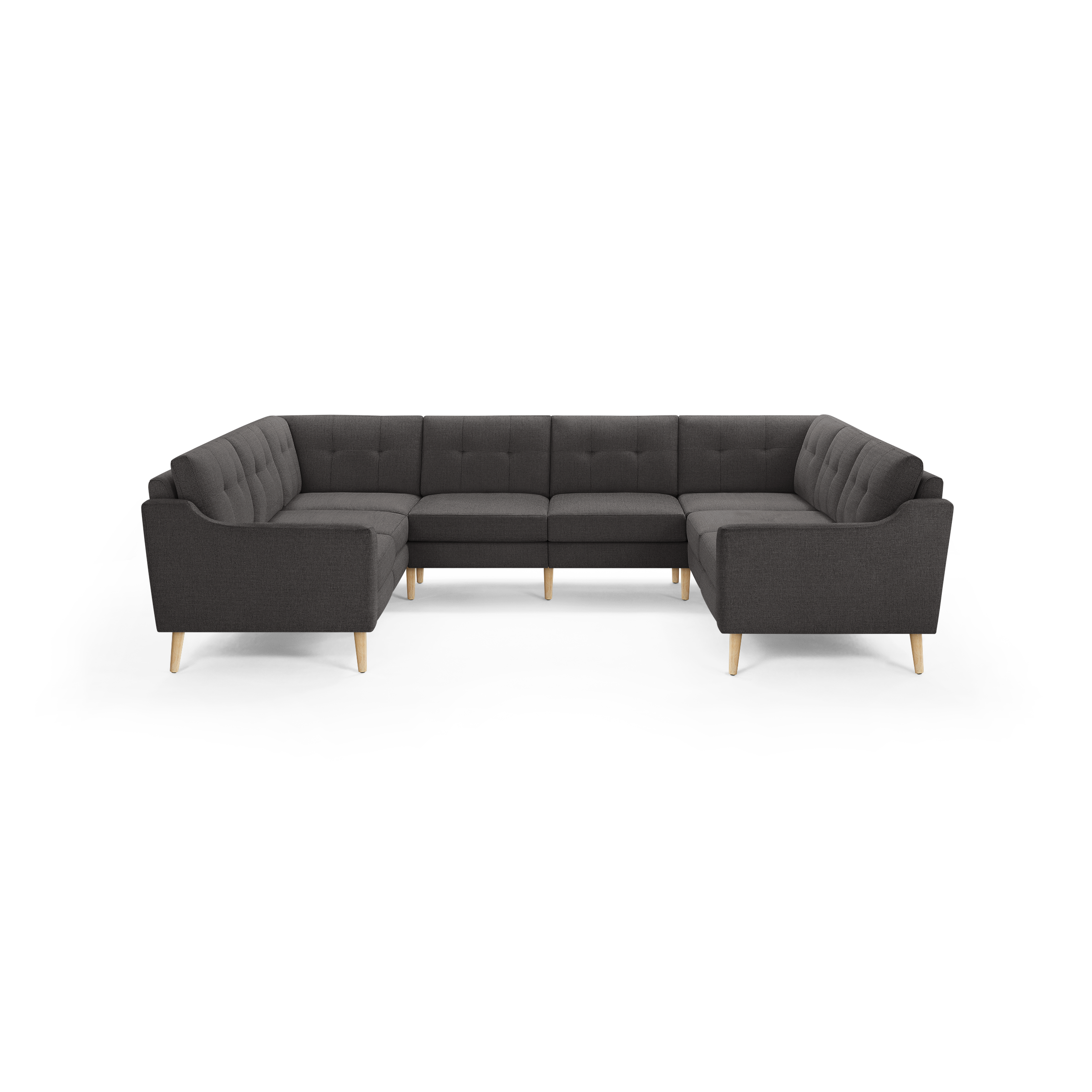 Dark gray fabric U-shaped sectional sofa with button-tufted back cushions and light wooden angled legs.