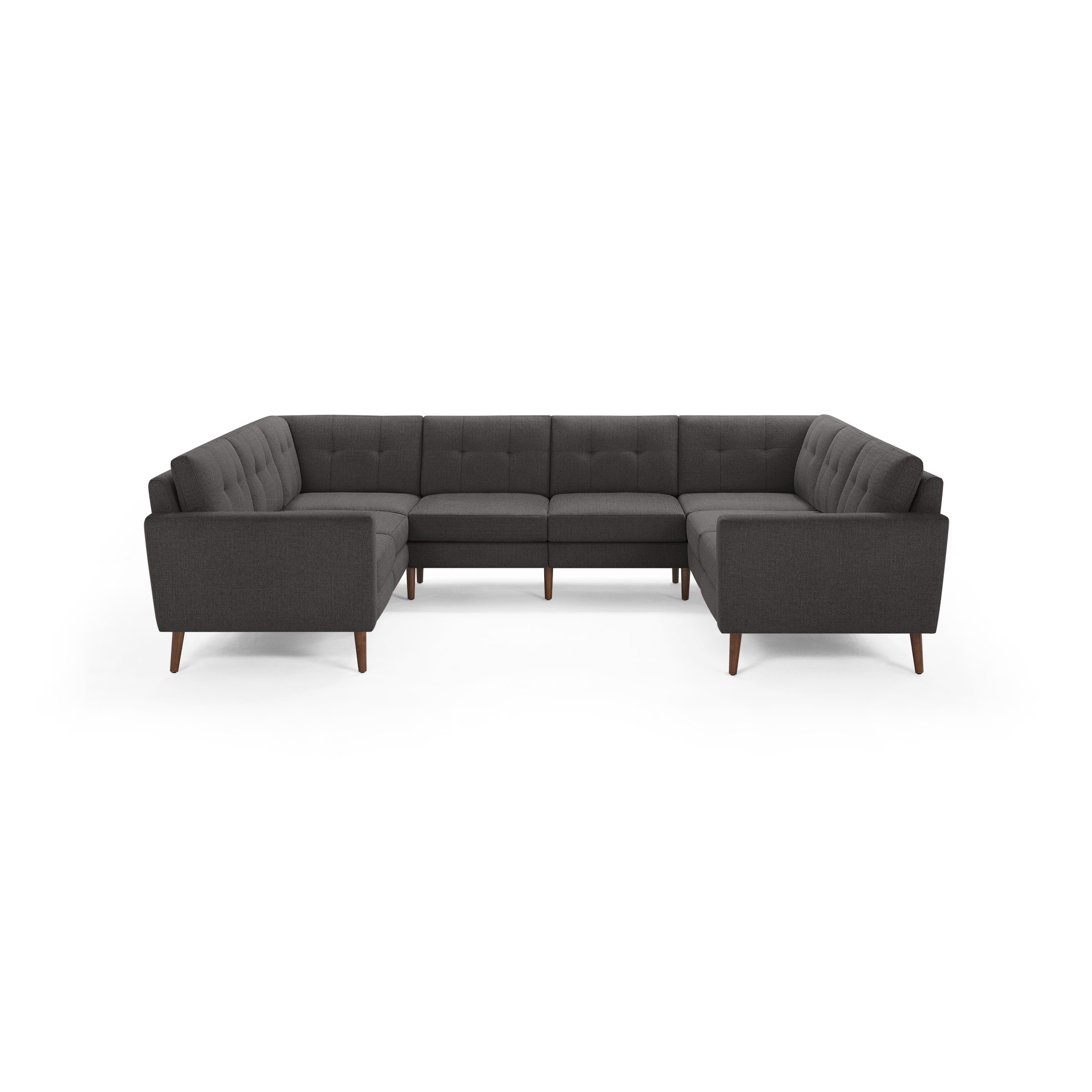 Dark gray fabric U-shaped sectional sofa with tufted back cushions and wooden tapered legs.