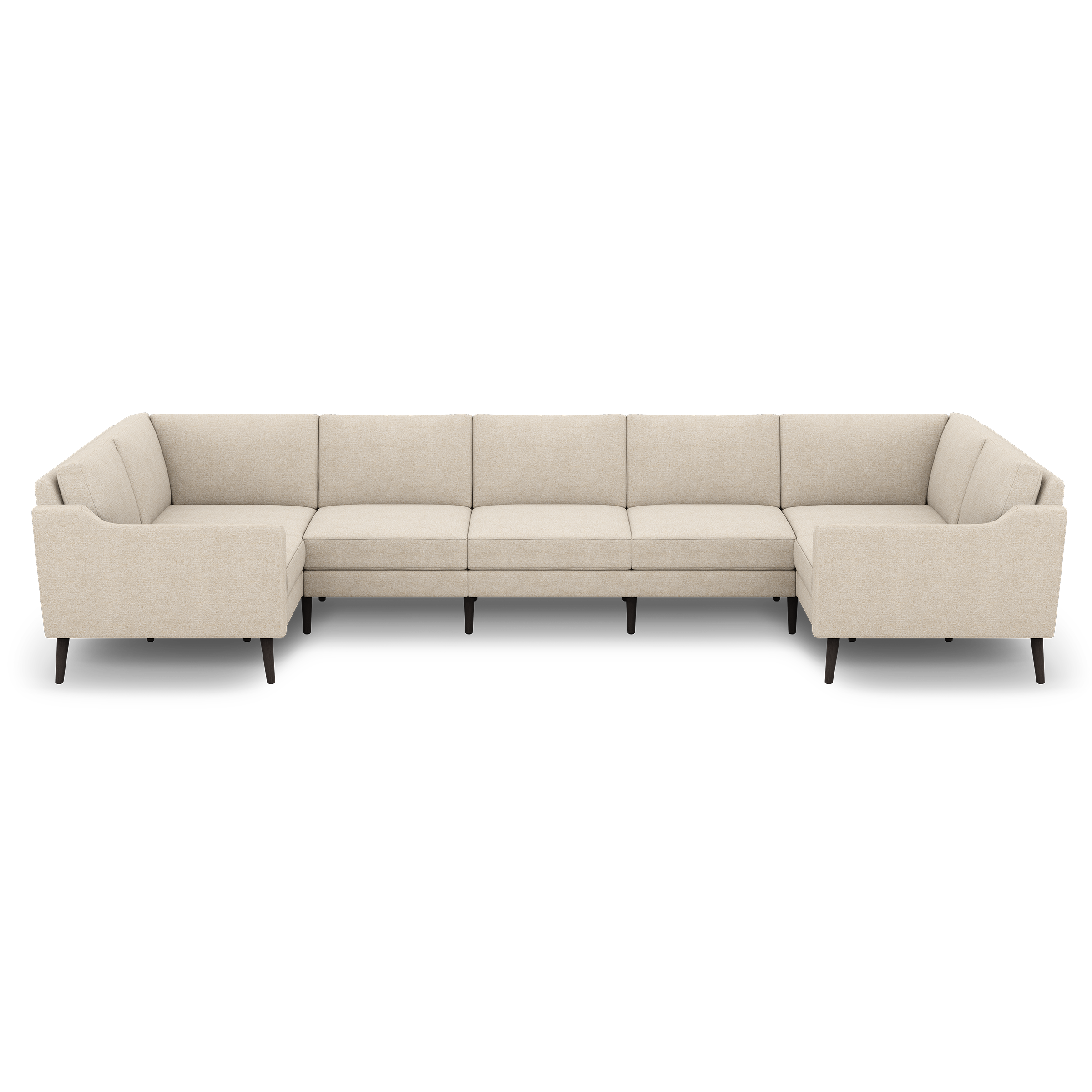 Large beige sectional sofa with clean lines, tufted cushions, slightly angled armrests, and dark wooden legs.