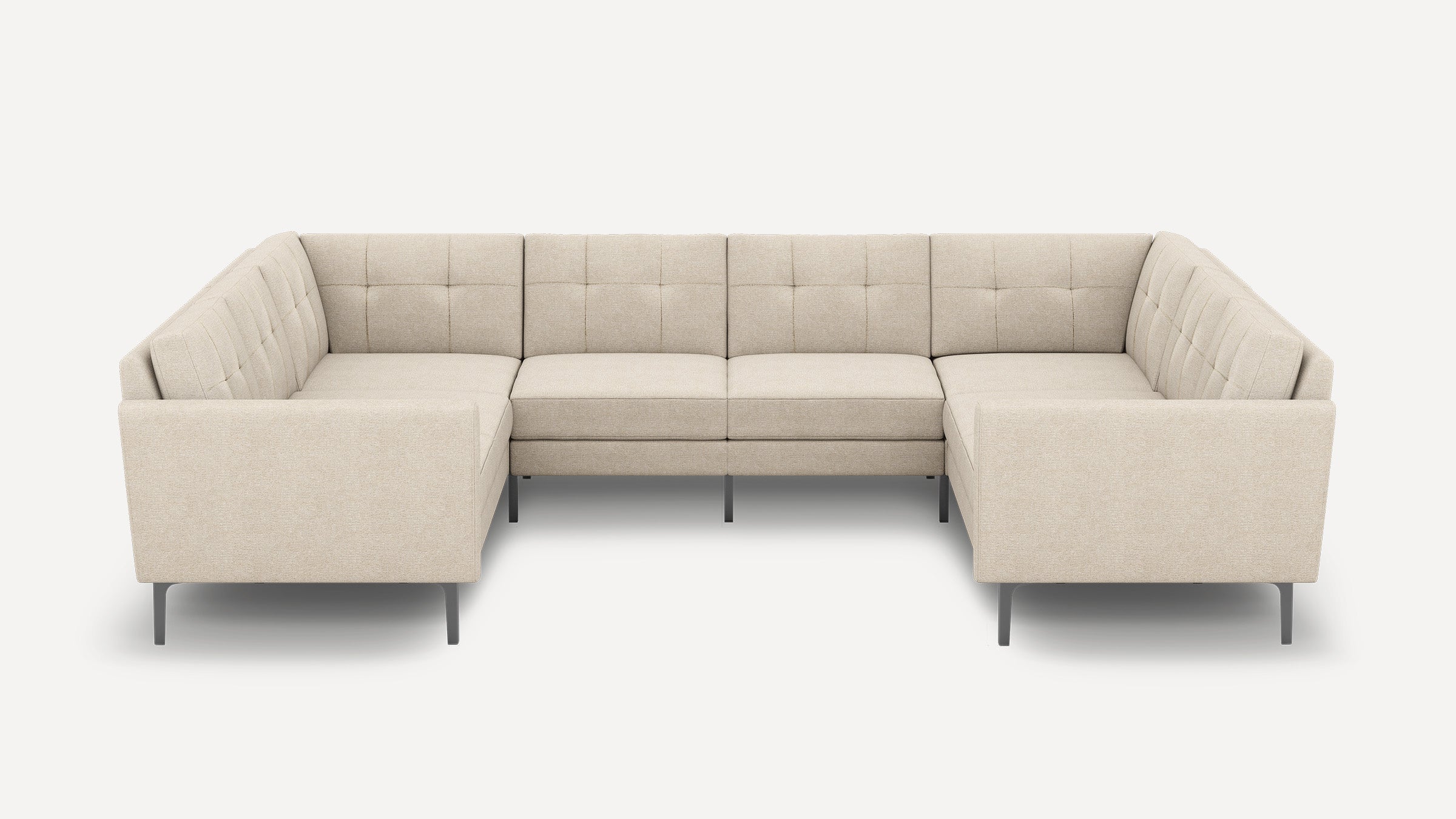 U-shaped beige sectional sofa with tufted back cushions, sleek metal legs, and modern minimalist design.