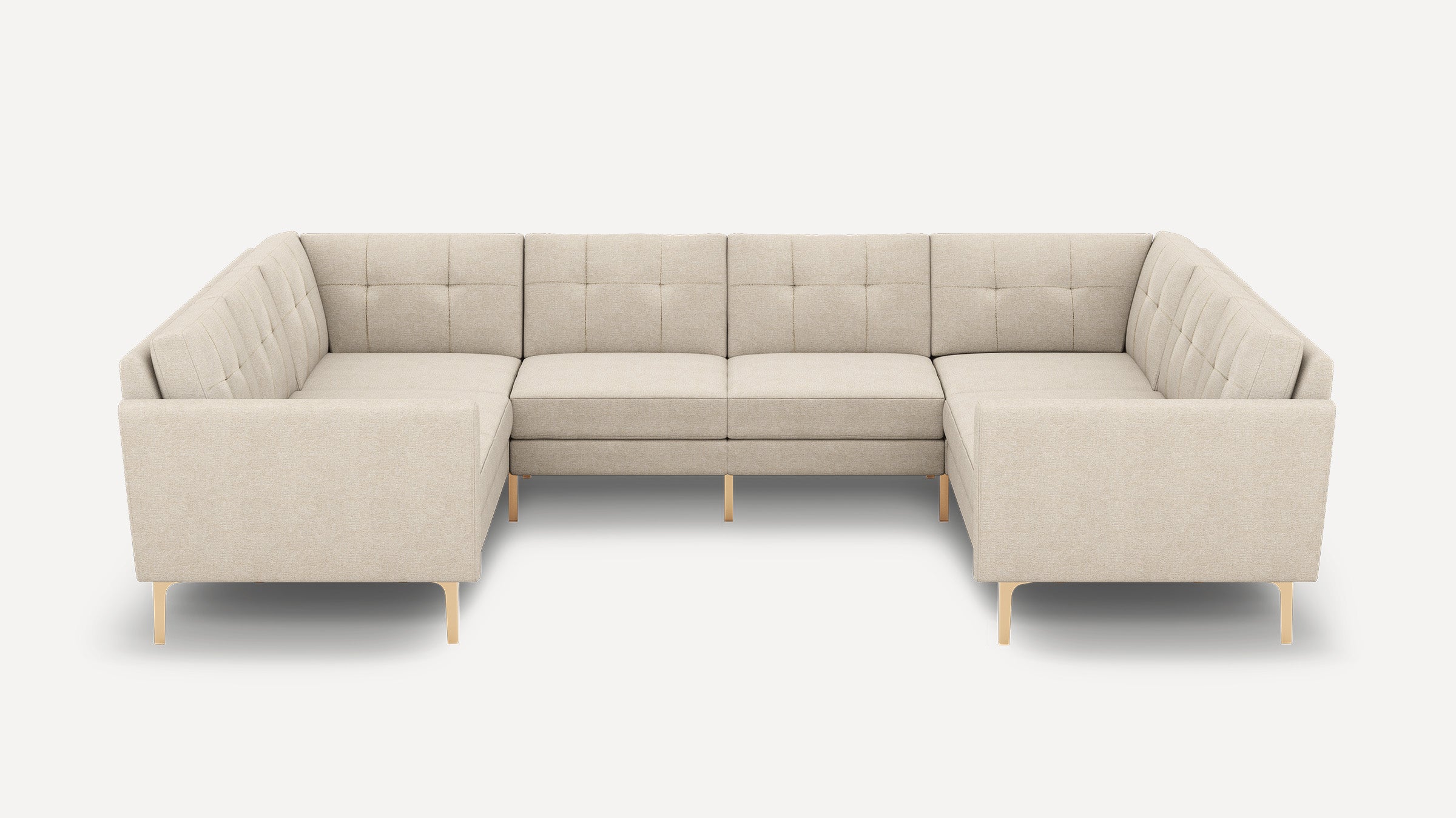 Modern beige fabric sectional sofa with tufted cushions and wooden legs, designed for spacious corner seating.