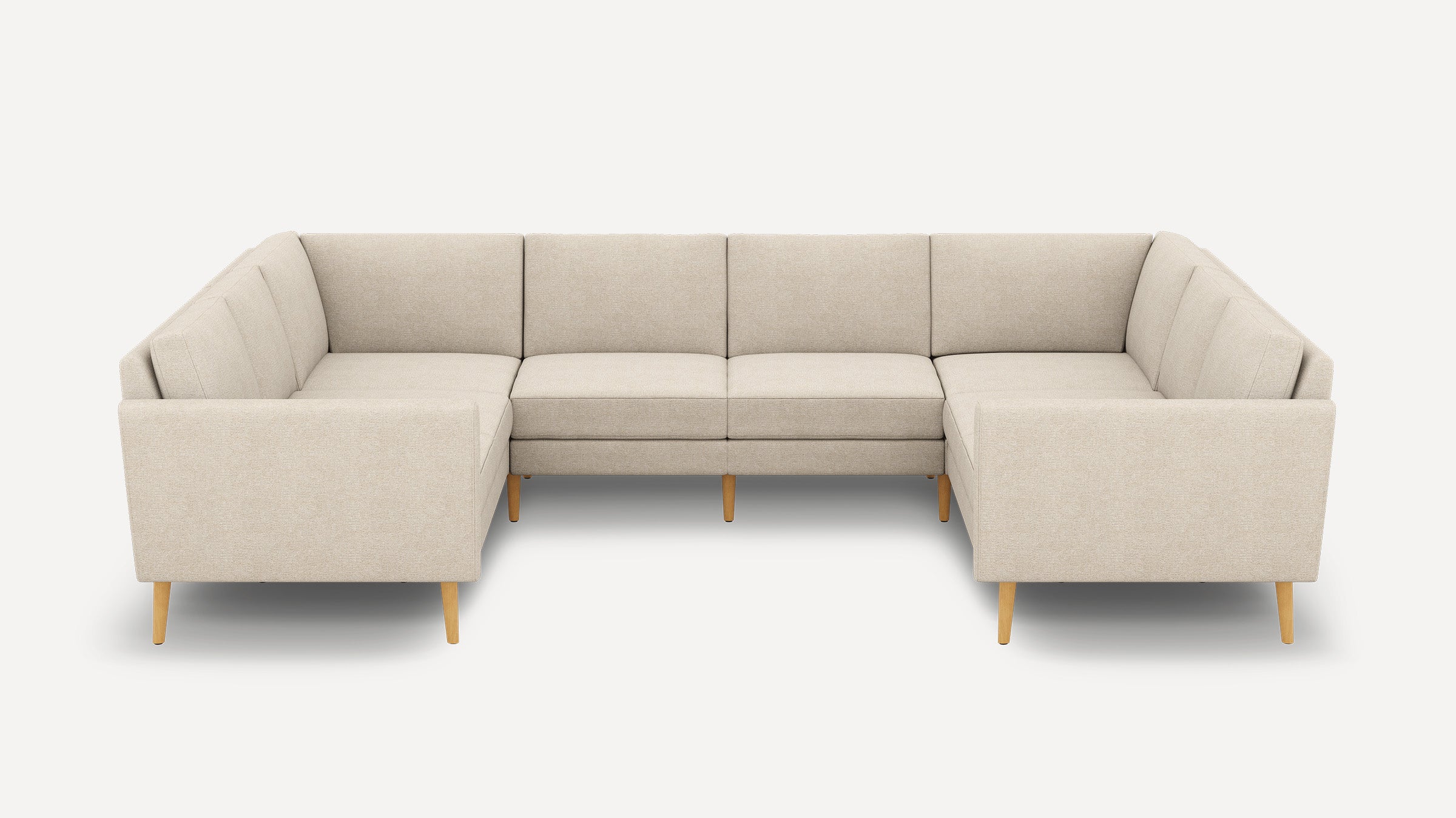 Beige fabric U-shaped sectional sofa with wooden legs, featuring clean lines and modern minimalist design.