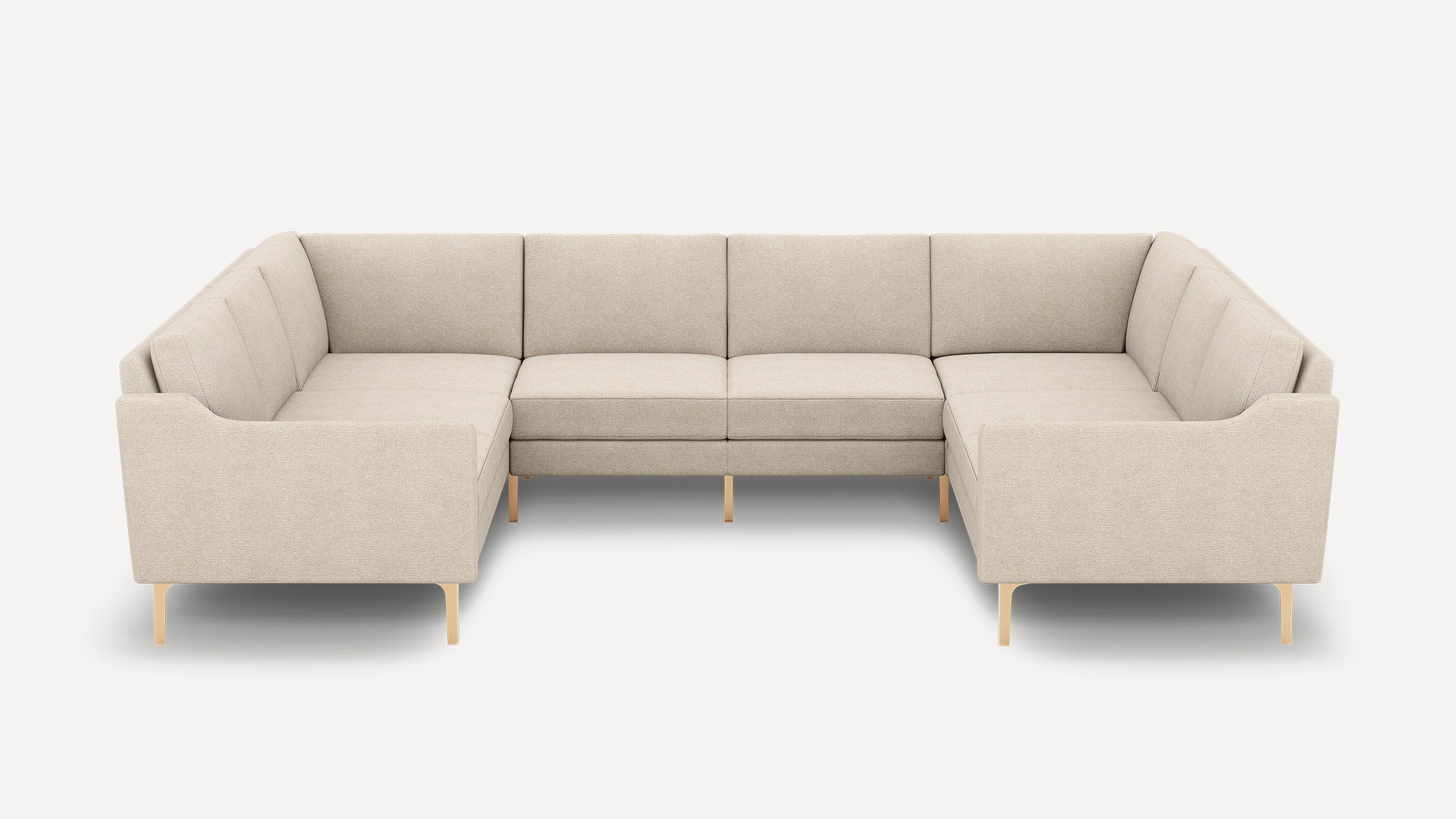 Beige U-shaped sectional sofa with tufted cushions, clean lines, and light wooden legs against a plain background.