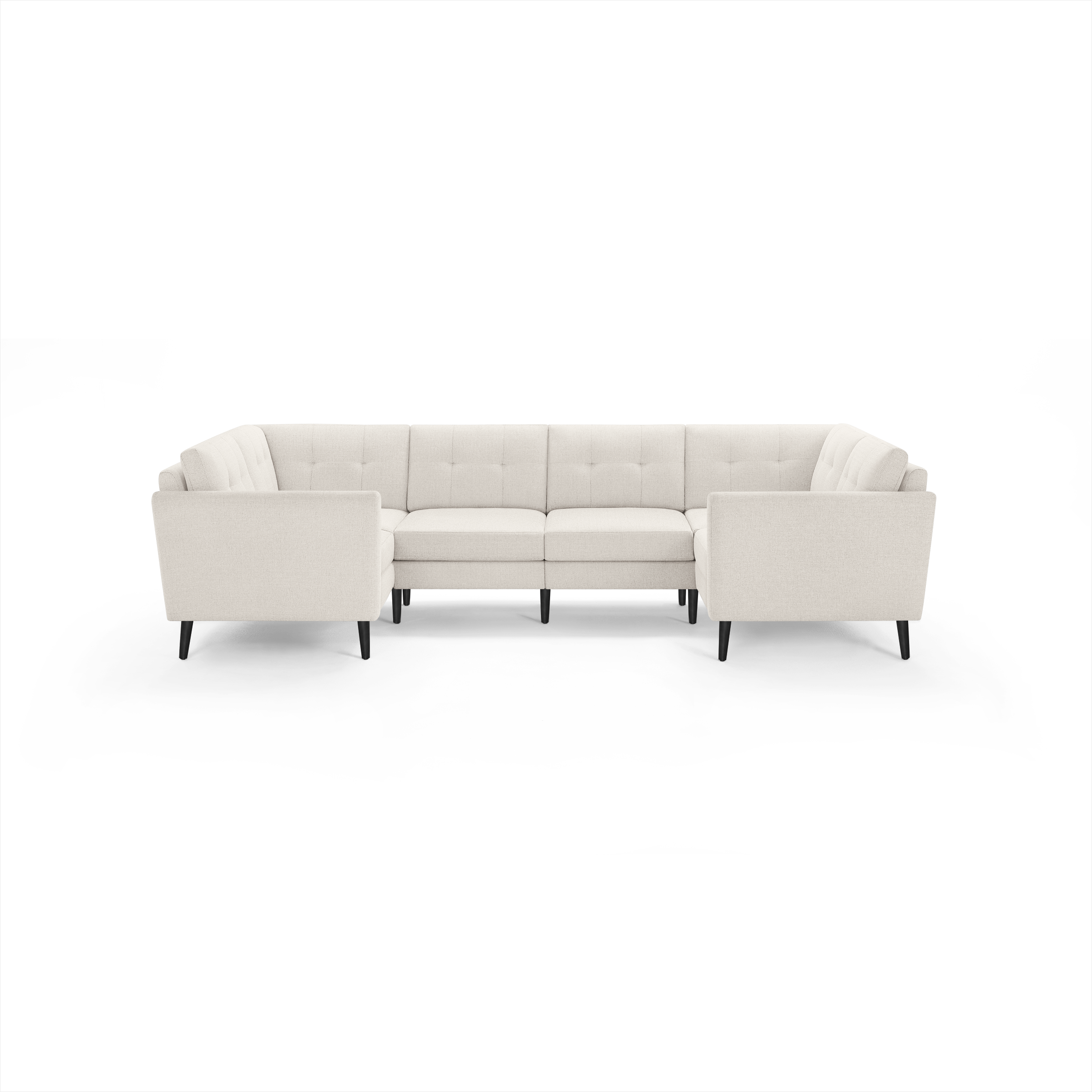 Modern U-shaped sectional sofa in light beige fabric with tufted cushions and black wooden legs, designed for spacious seating.