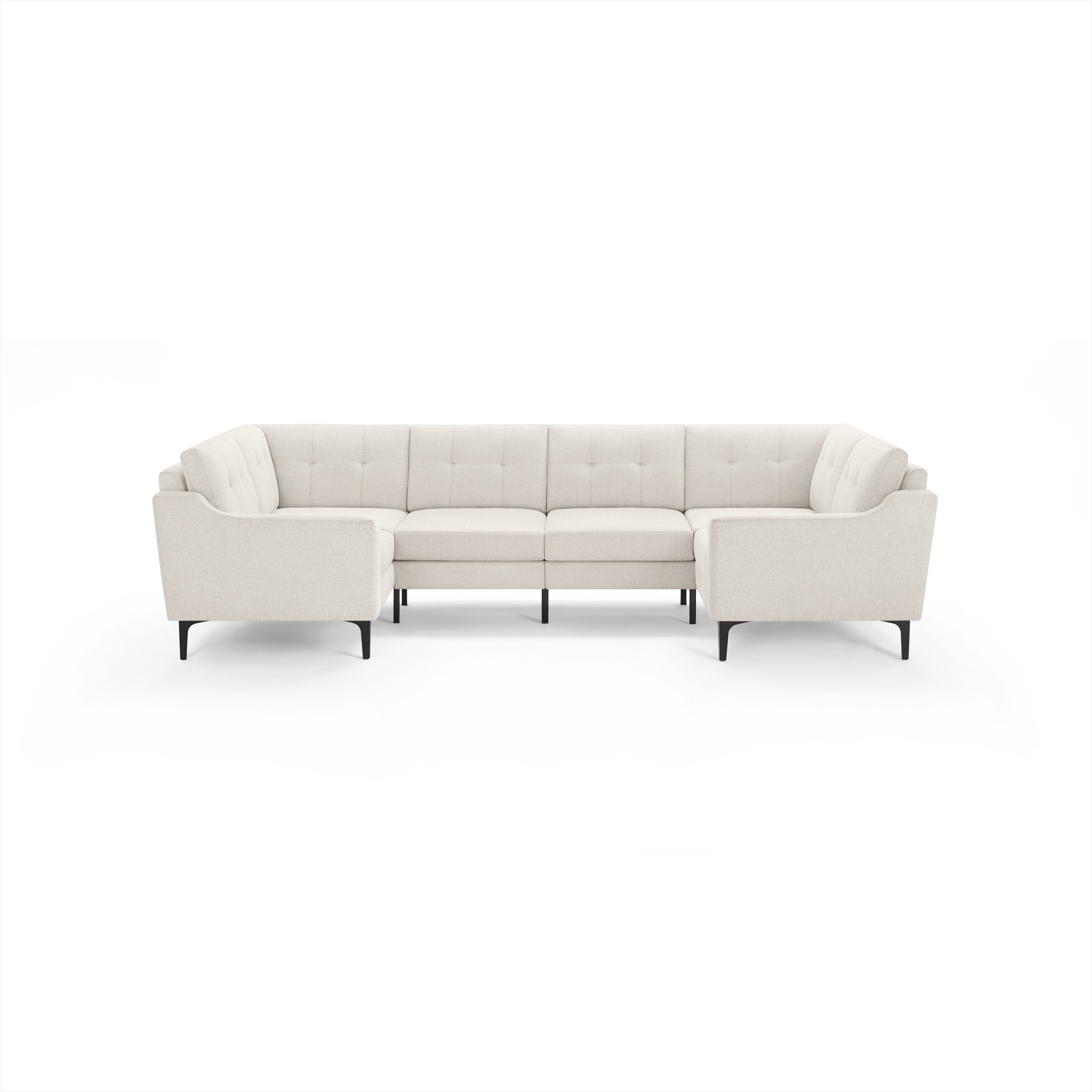 Cream-colored modern sectional sofa with tufted back cushions, angled armrests, and black metal legs on a clear background.