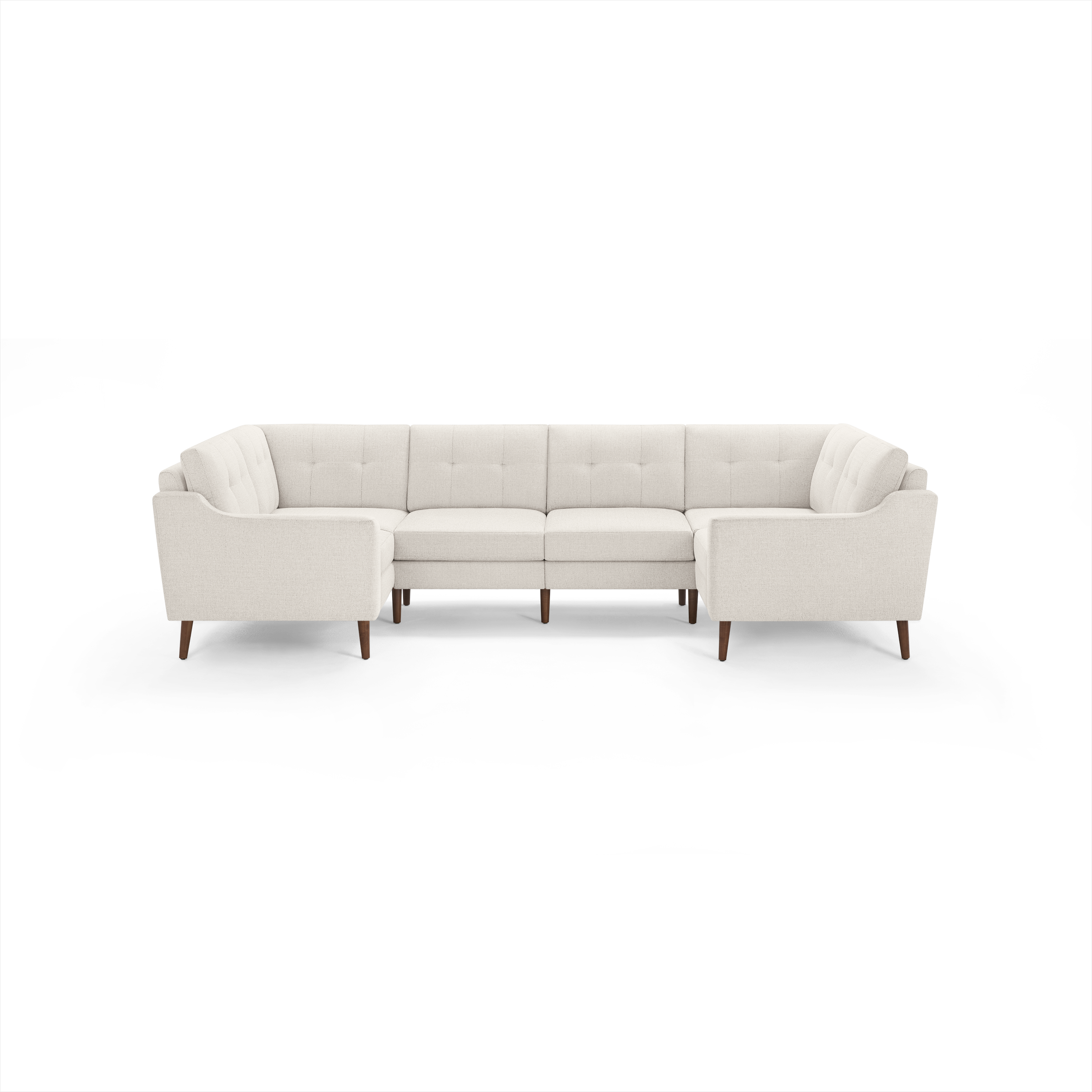 Cream-colored modern sectional sofa with tufted back cushions and wooden legs, designed for spacious seating.