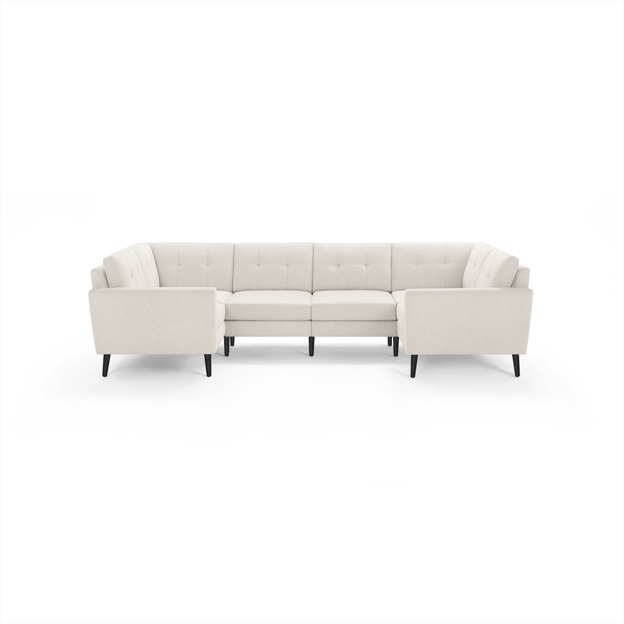 Cream-colored fabric sectional sofa with tufted back cushions and black wooden legs, arranged in a U-shape.