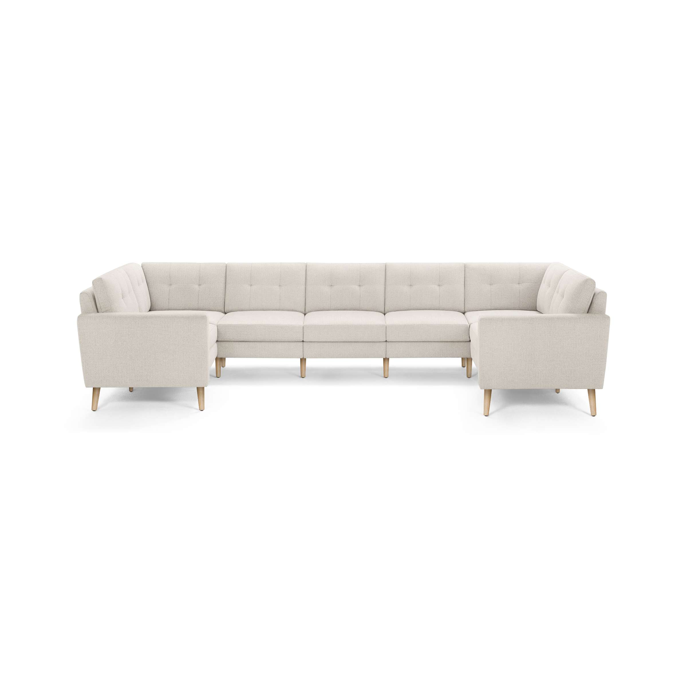 Beige L-shaped sectional sofa with tufted back cushions and light wooden legs, modern and minimalist design.