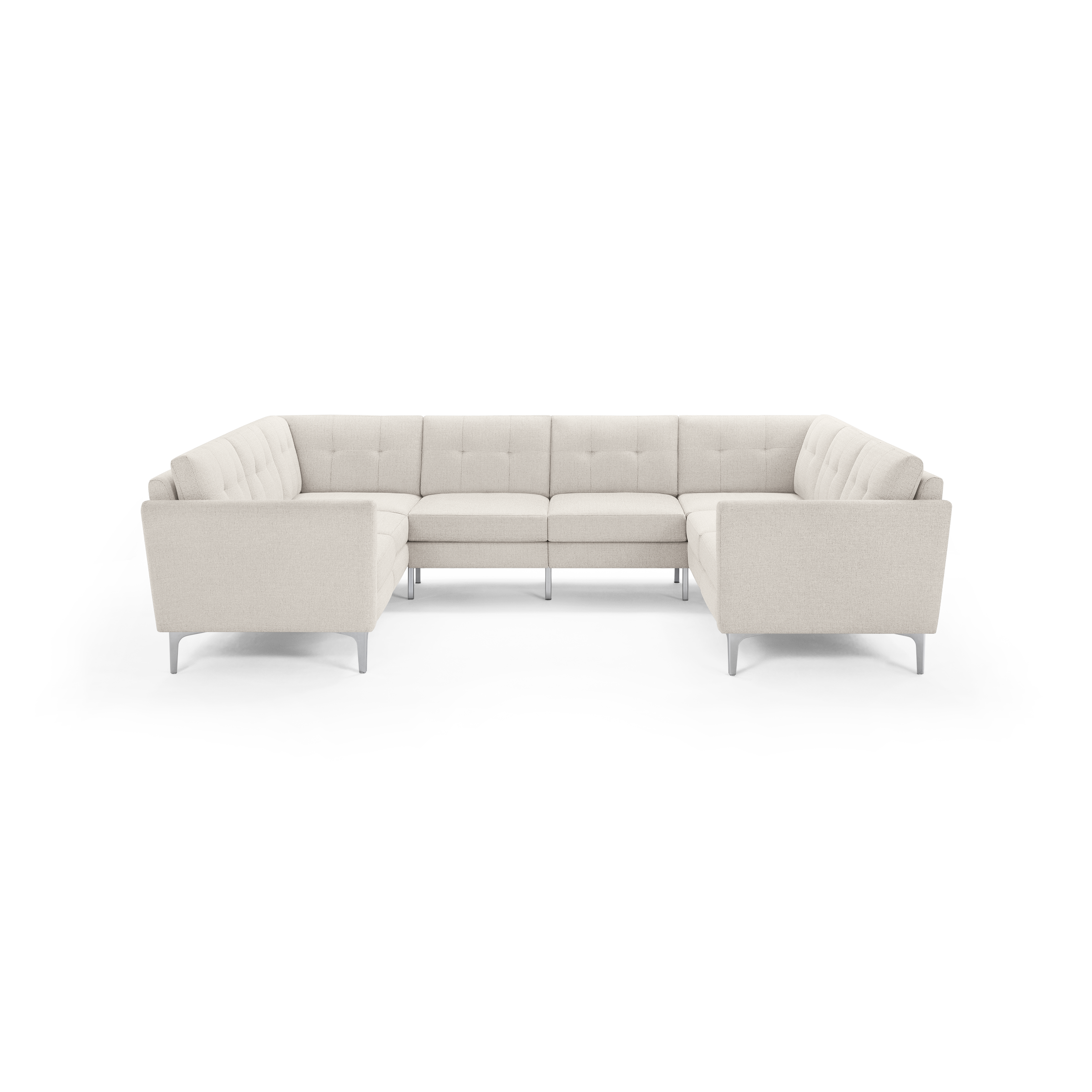 Beige fabric U-shaped sectional sofa with tufted back cushions and sleek metal legs, designed for spacious seating.