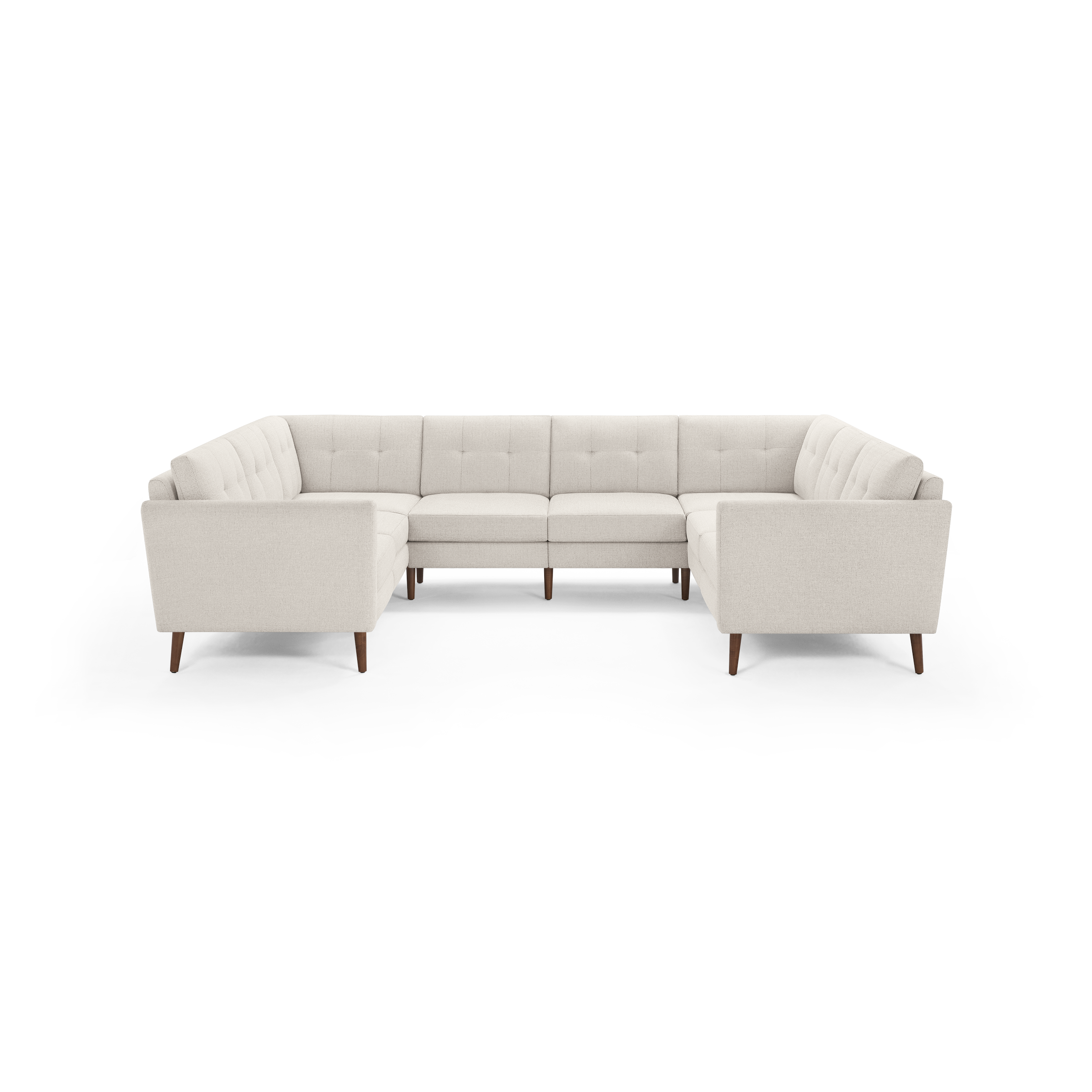 Cream-colored tufted fabric U-shaped sectional sofa with wooden legs, modern design, and cushioned seats and backs.