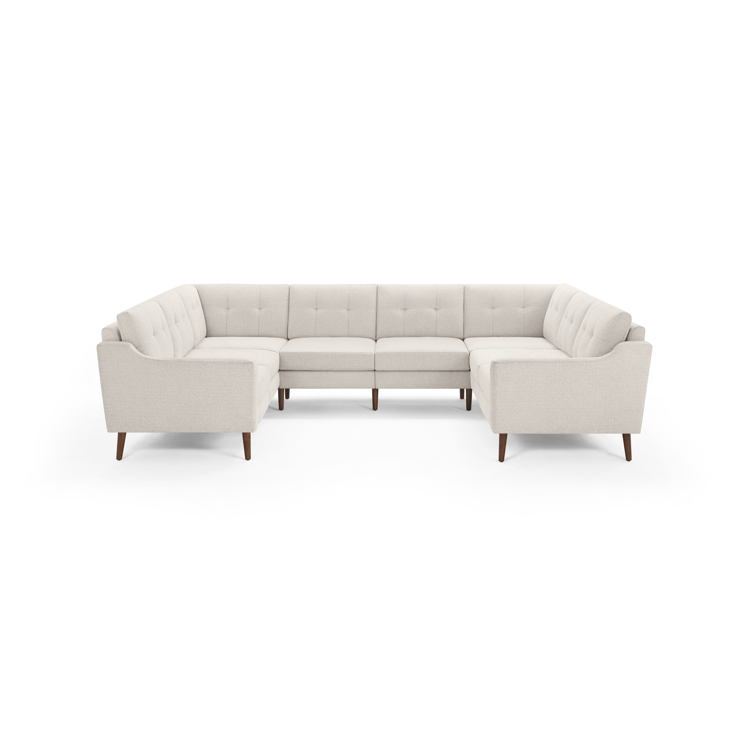 Large beige fabric U-shaped sectional sofa with tufted back cushions and wooden tapered legs, designed for spacious seating.